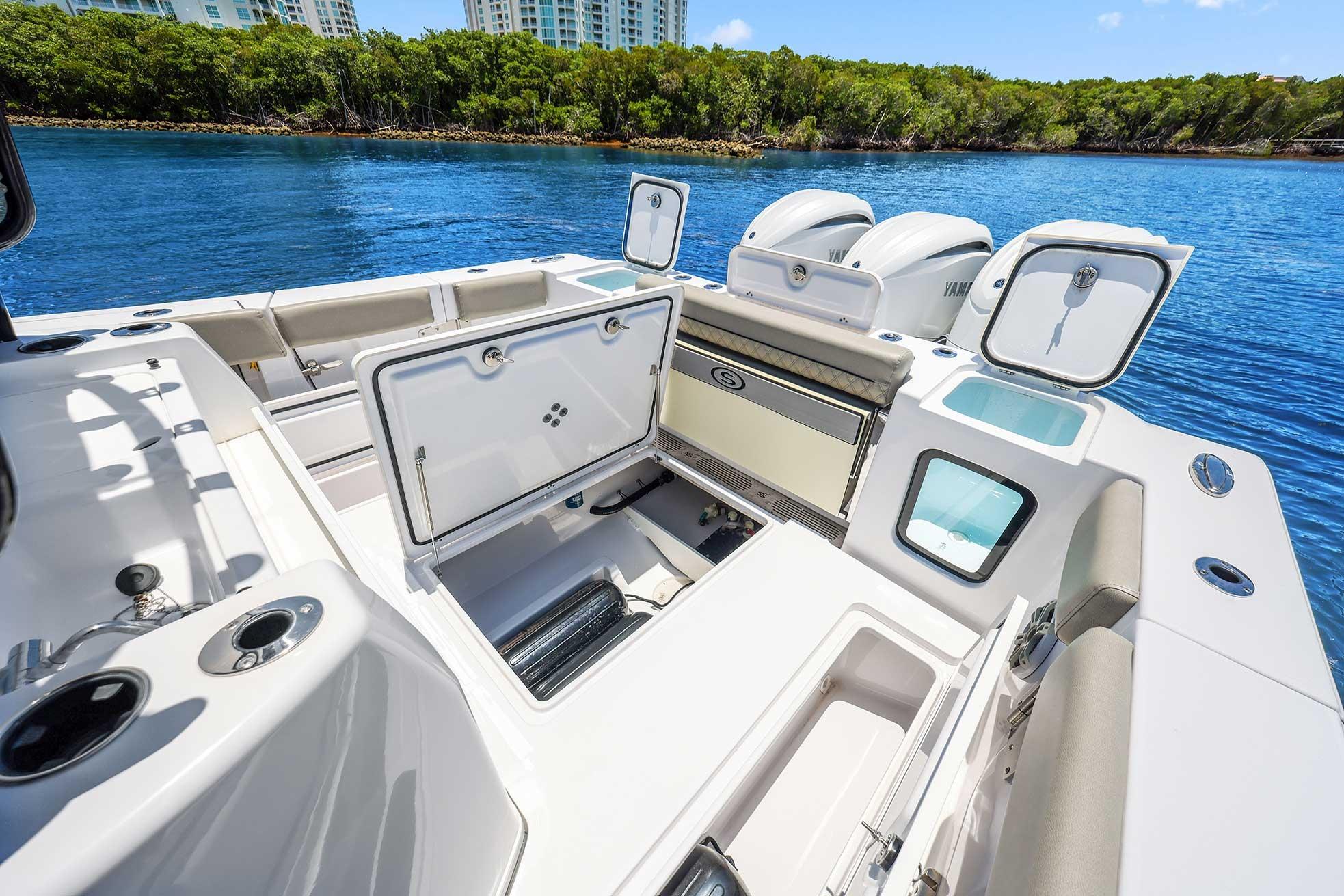 2024 Sportsman Open 352 Center Console boat interior with open storage compartments.