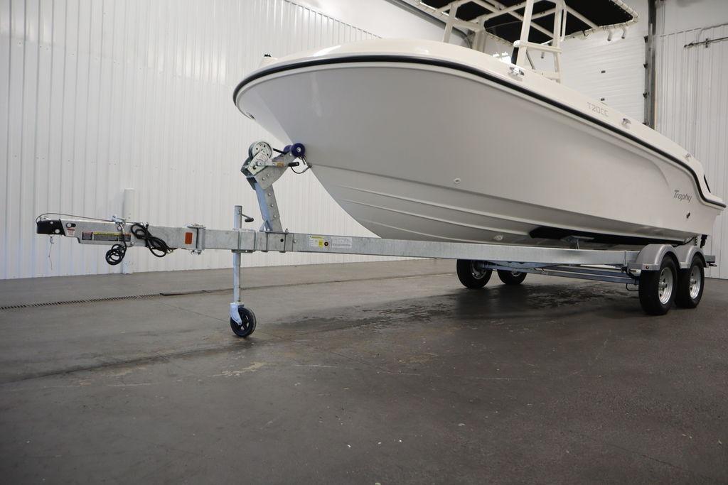 2026 Bayliner Trophy T20CC boat on trailer in indoor storage facility.