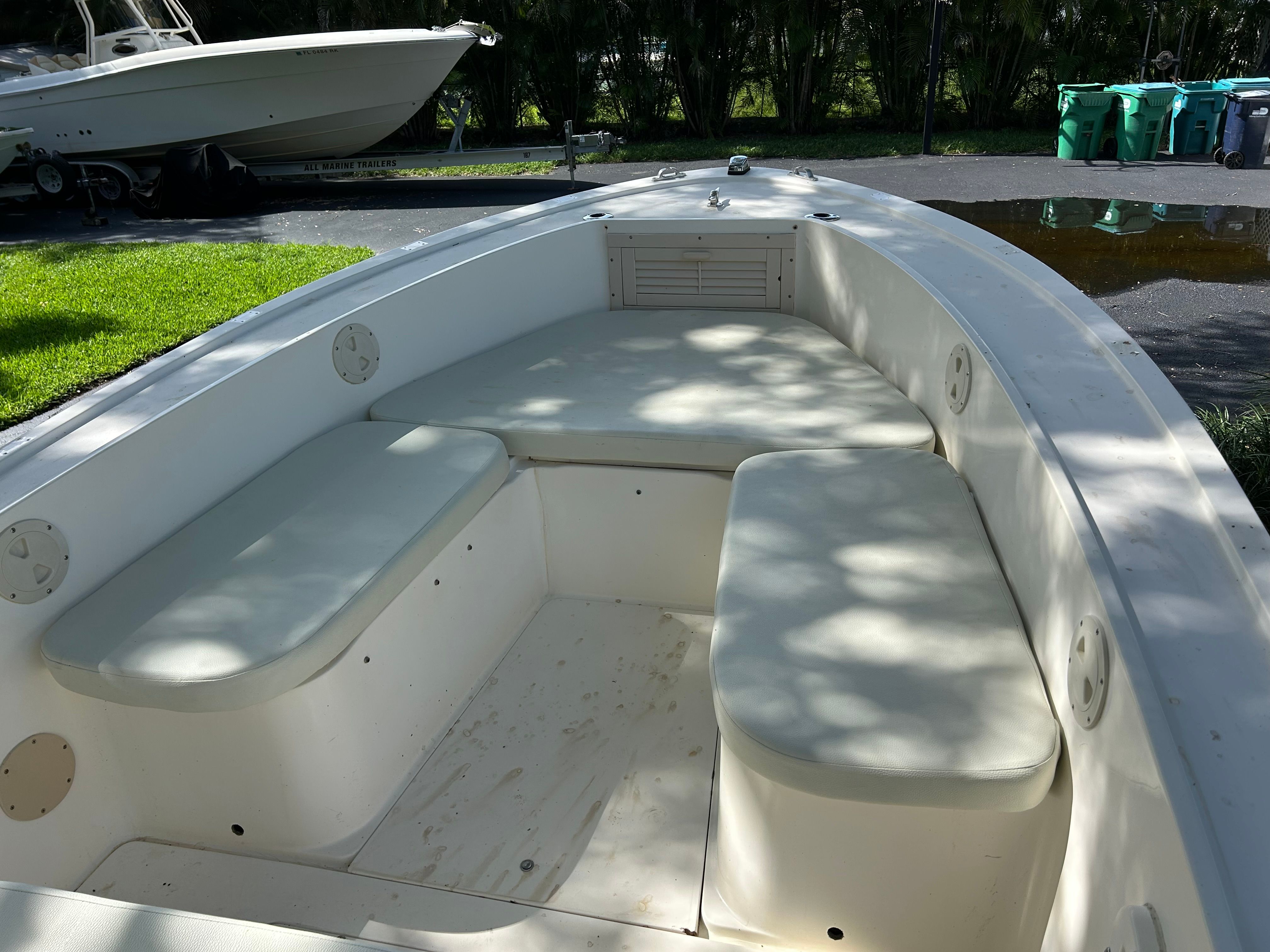Interior of a 1992 Mako 221 boat with seating benches.