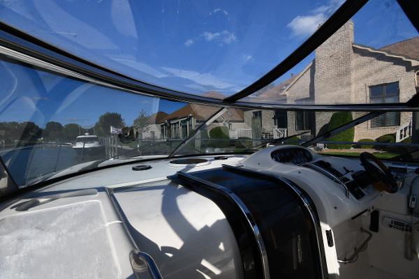 Cockpit view of 1997 Sunseeker Camargue 47 yacht with clear skies.