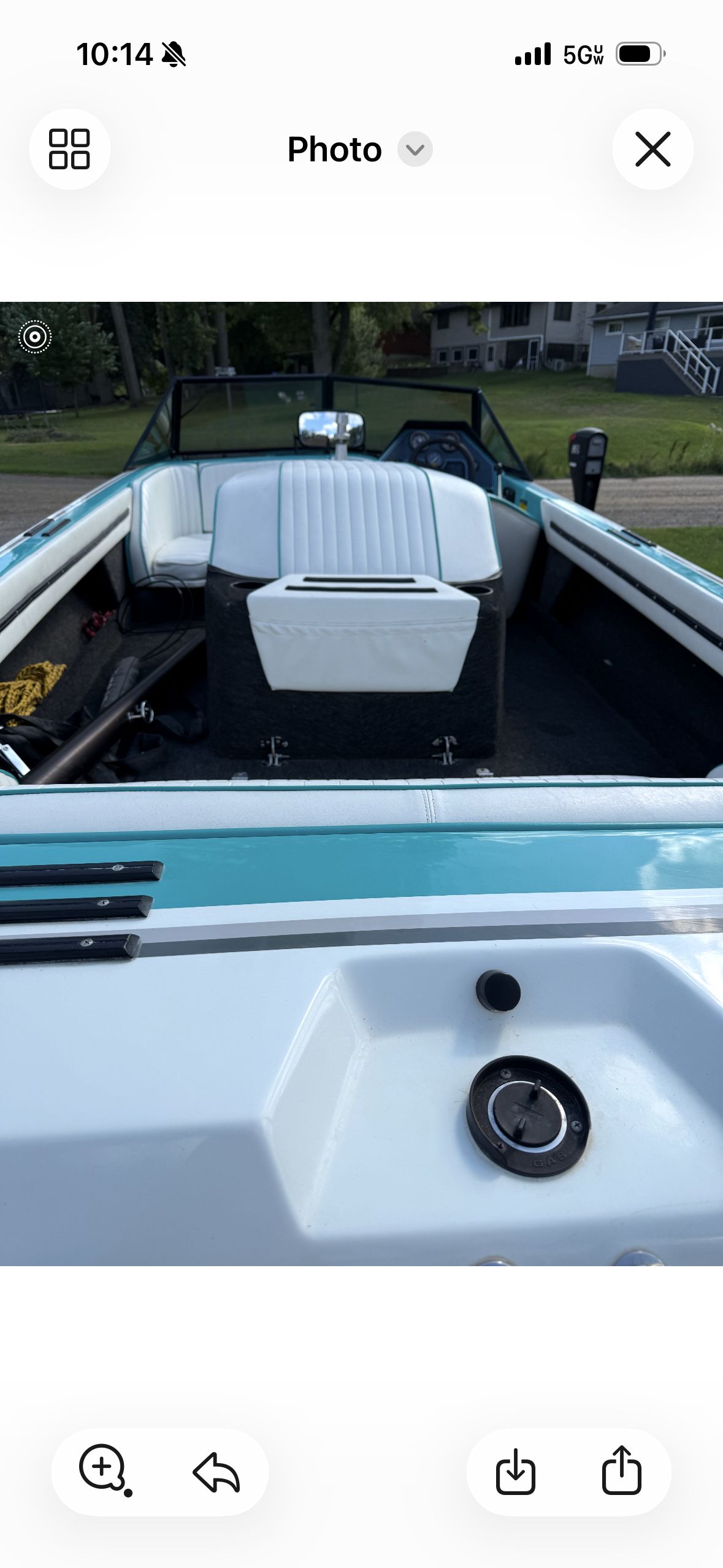 Interior view of a 1992 Malibu Skier with white and blue seating.