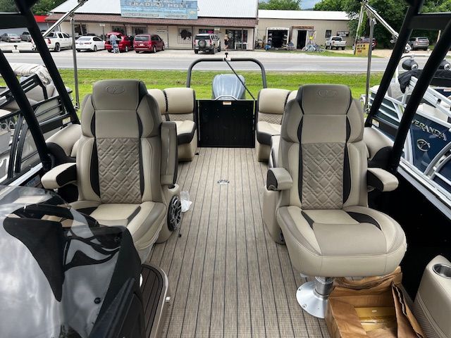 Interior view of a 2023 Veranda VP22RCT pontoon boat with luxurious seating.
