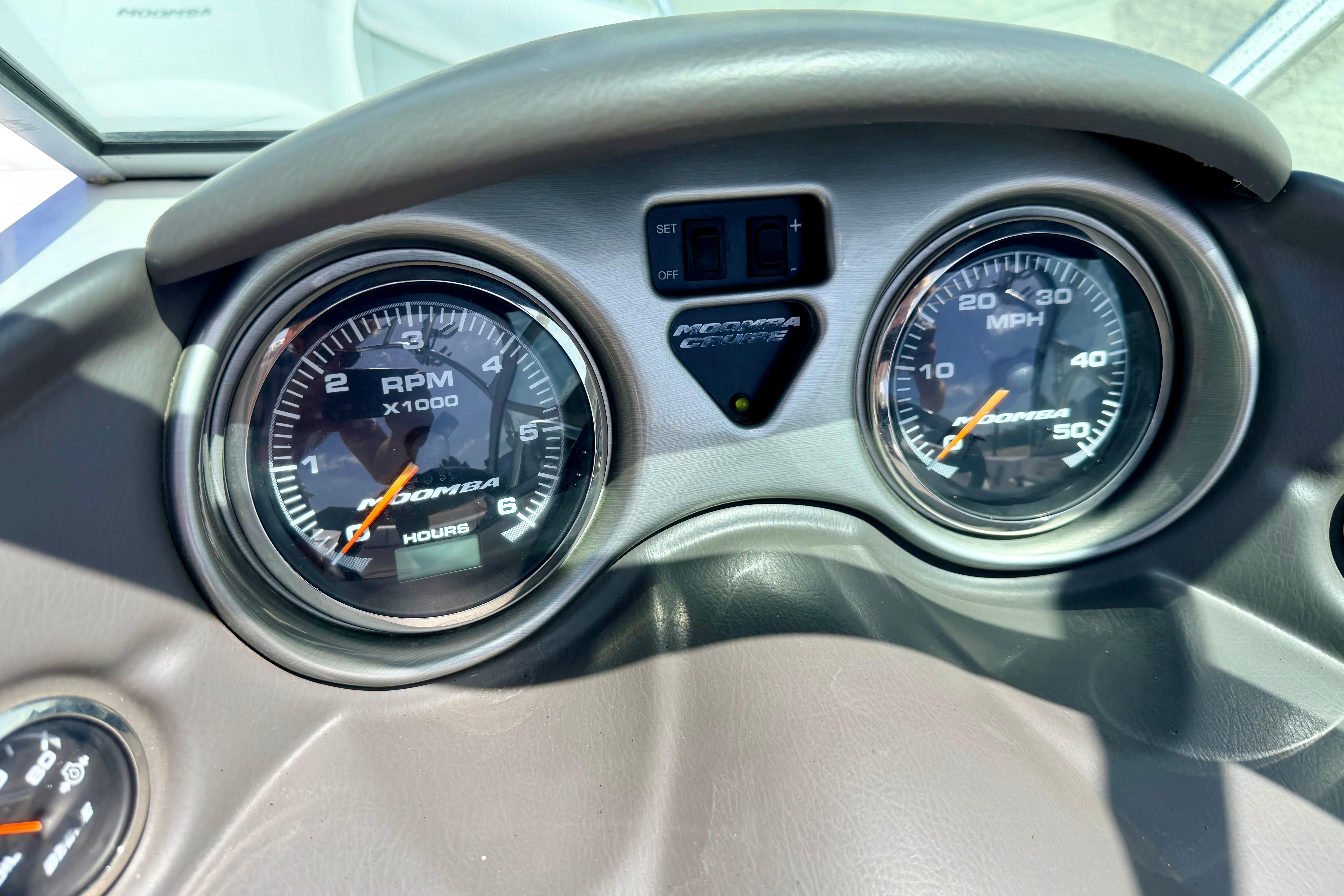 Dashboard of 2008 Moomba Outback V showing RPM and MPH gauges.