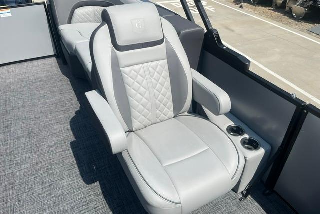 Luxurious seating on 2026 Godfrey Sweetwater 2286 SBC pontoon boat with cup holders.