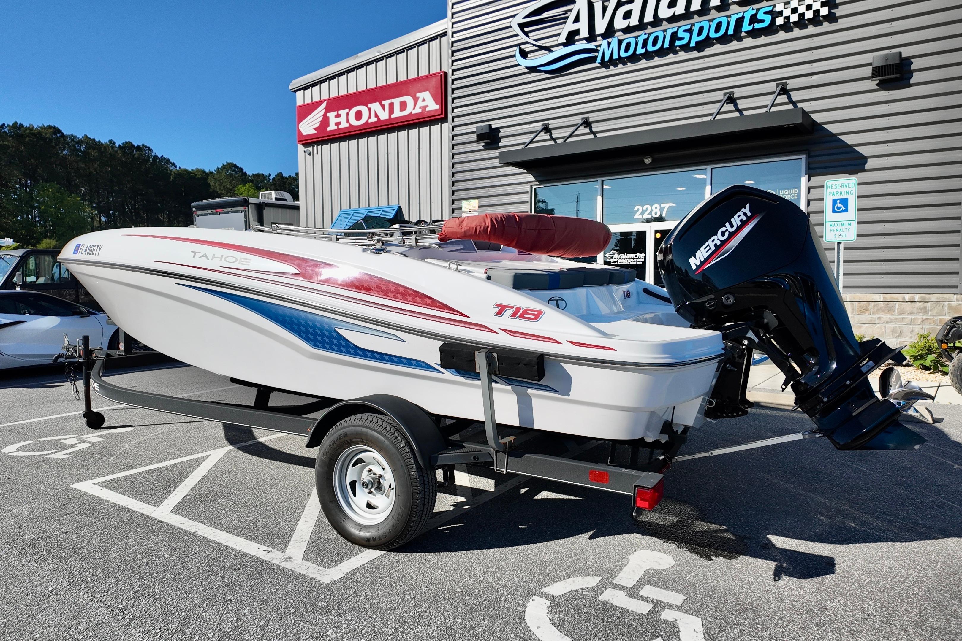 2024 Tahoe T18 boat with Mercury engine at Avalanche Motorsports dealership.