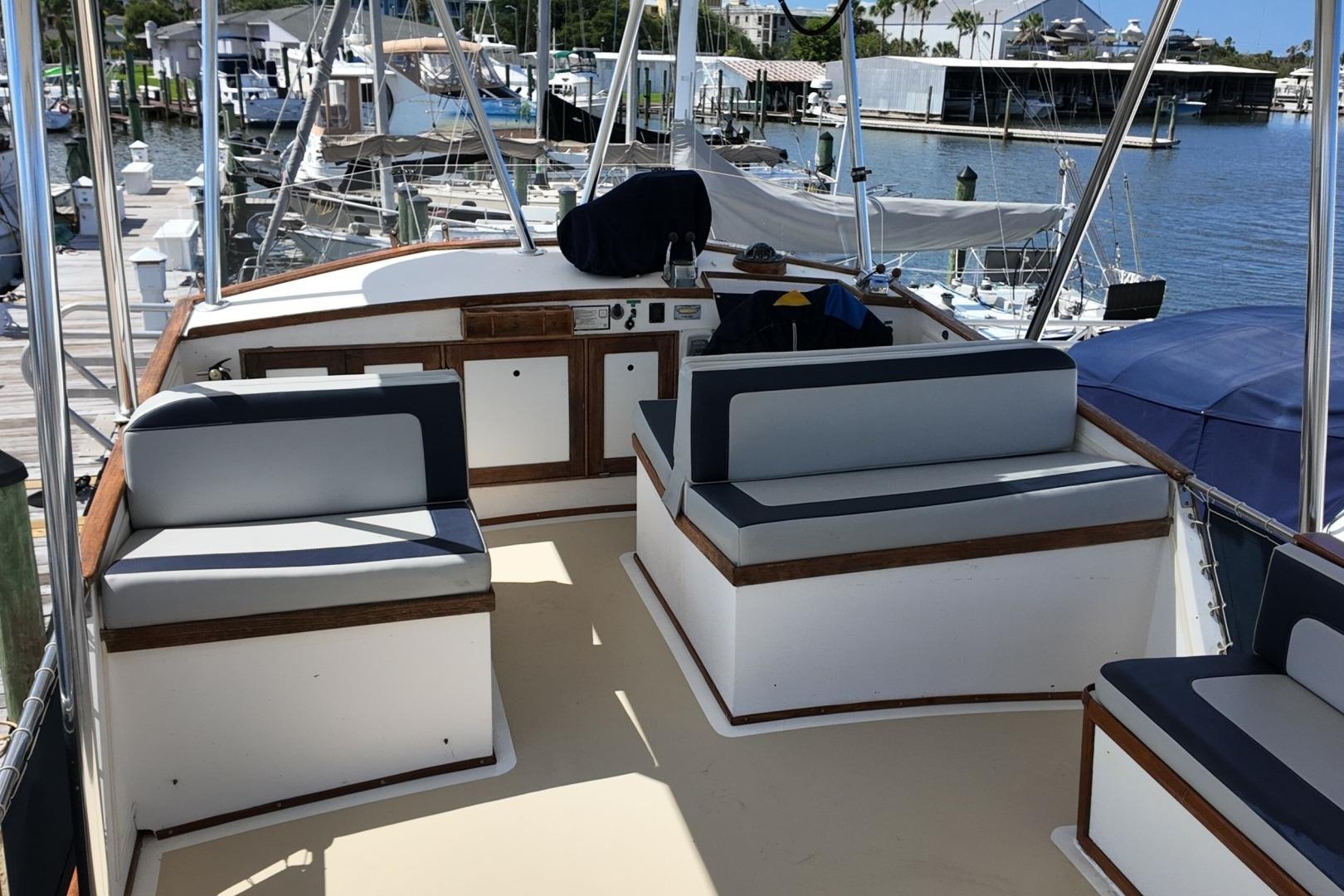 1978 Grand Banks 42 Classic yacht interior with seating, docked at marina.