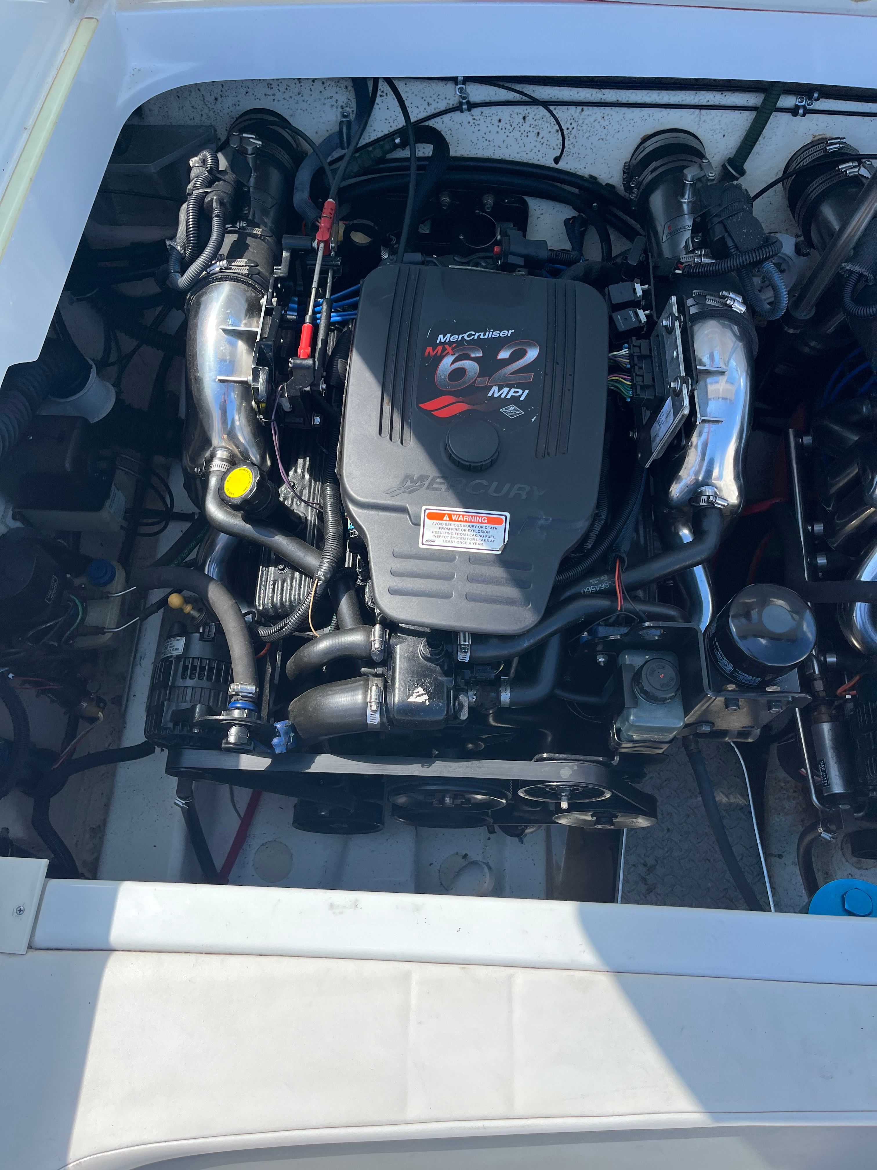 Engine compartment of a 2004 Formula 292 FASTech with a MerCruiser 6.2 MPI engine.