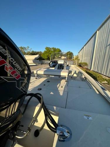 2024 Ranger RB190 boat with Mercury Pro XS engine, docked outdoors.