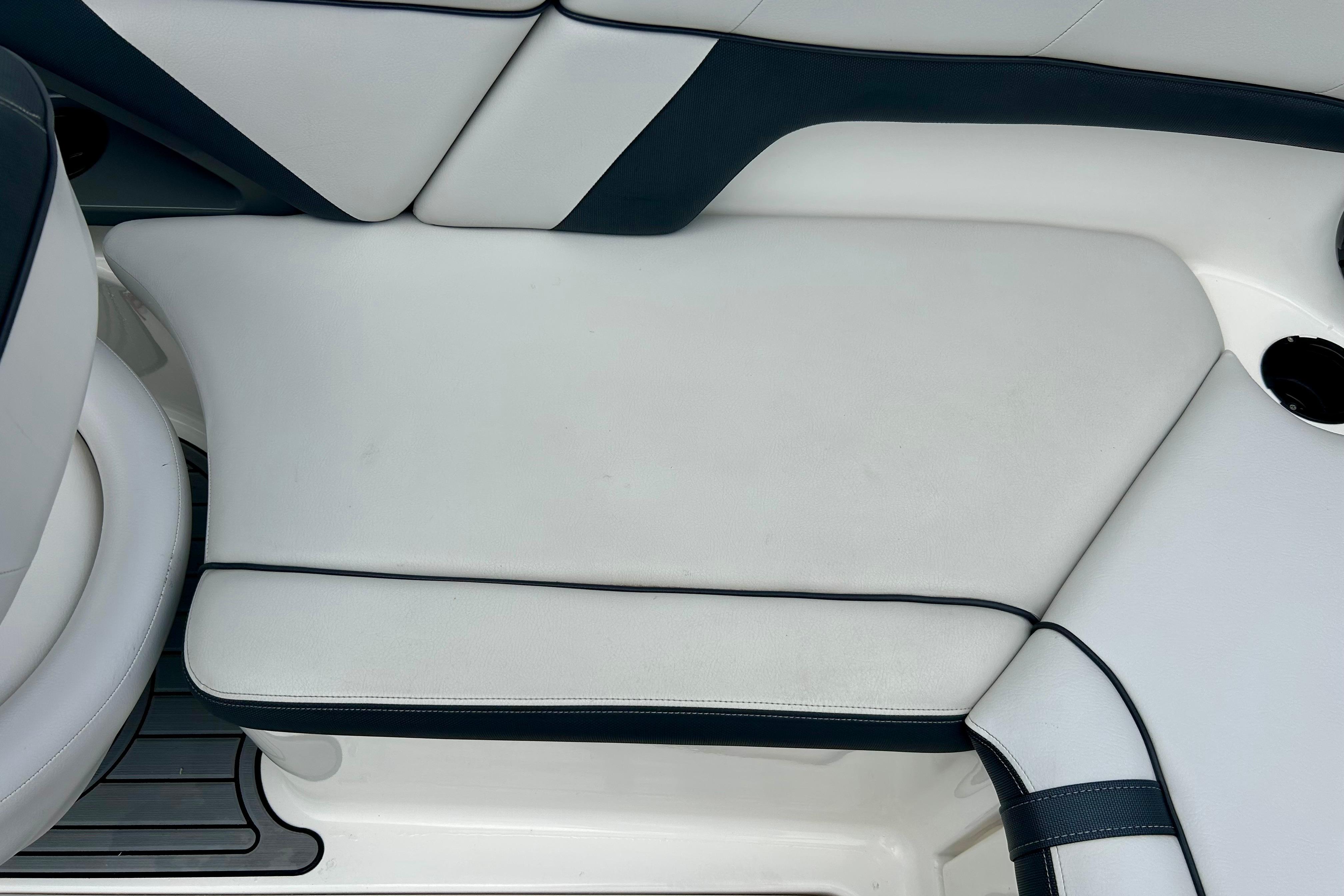 2015 Yamaha AR210 boat interior seating with white and dark accents.