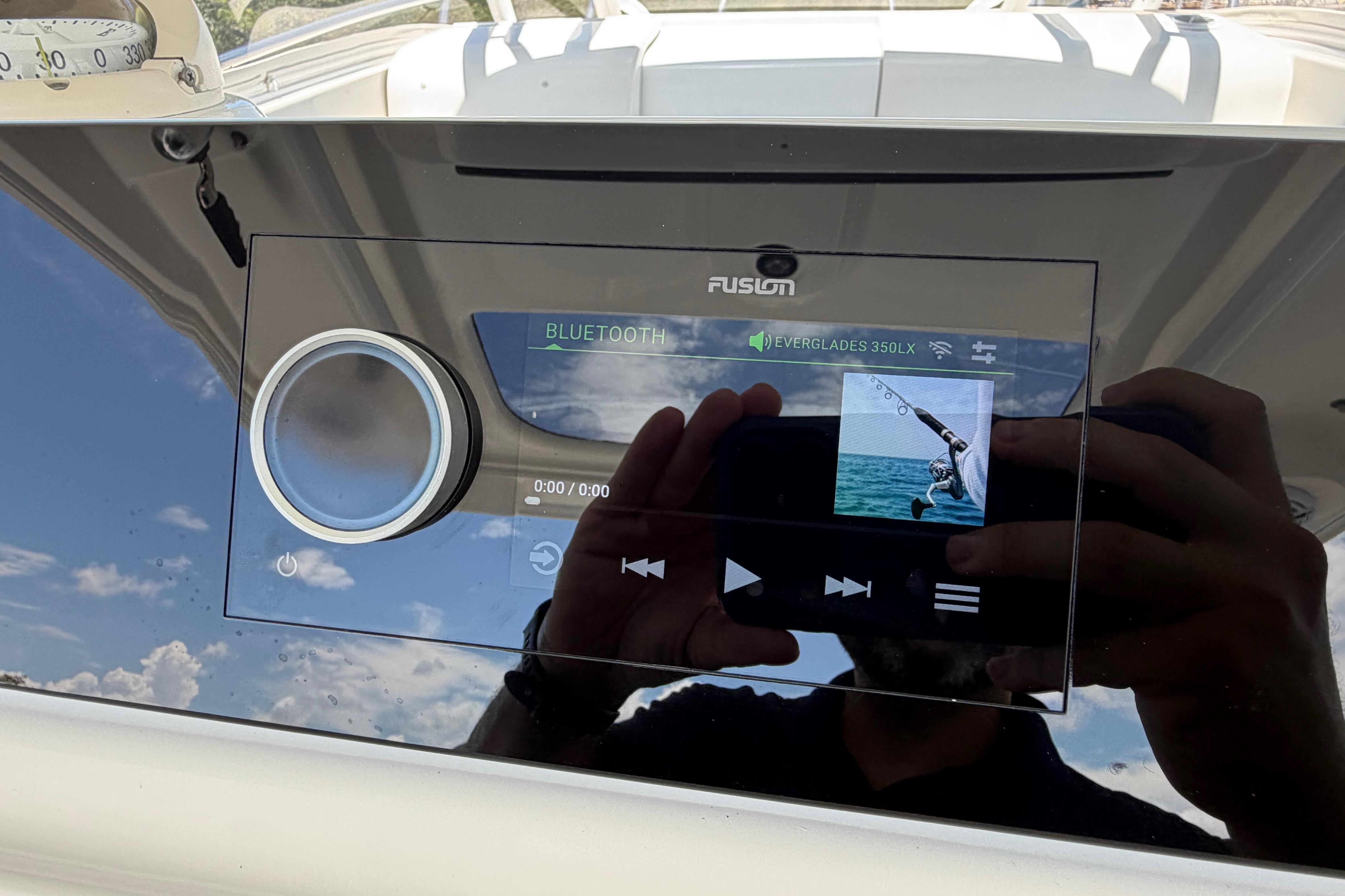Fusion audio system on 2009 Everglades 350LX boat, displaying Bluetooth connectivity.