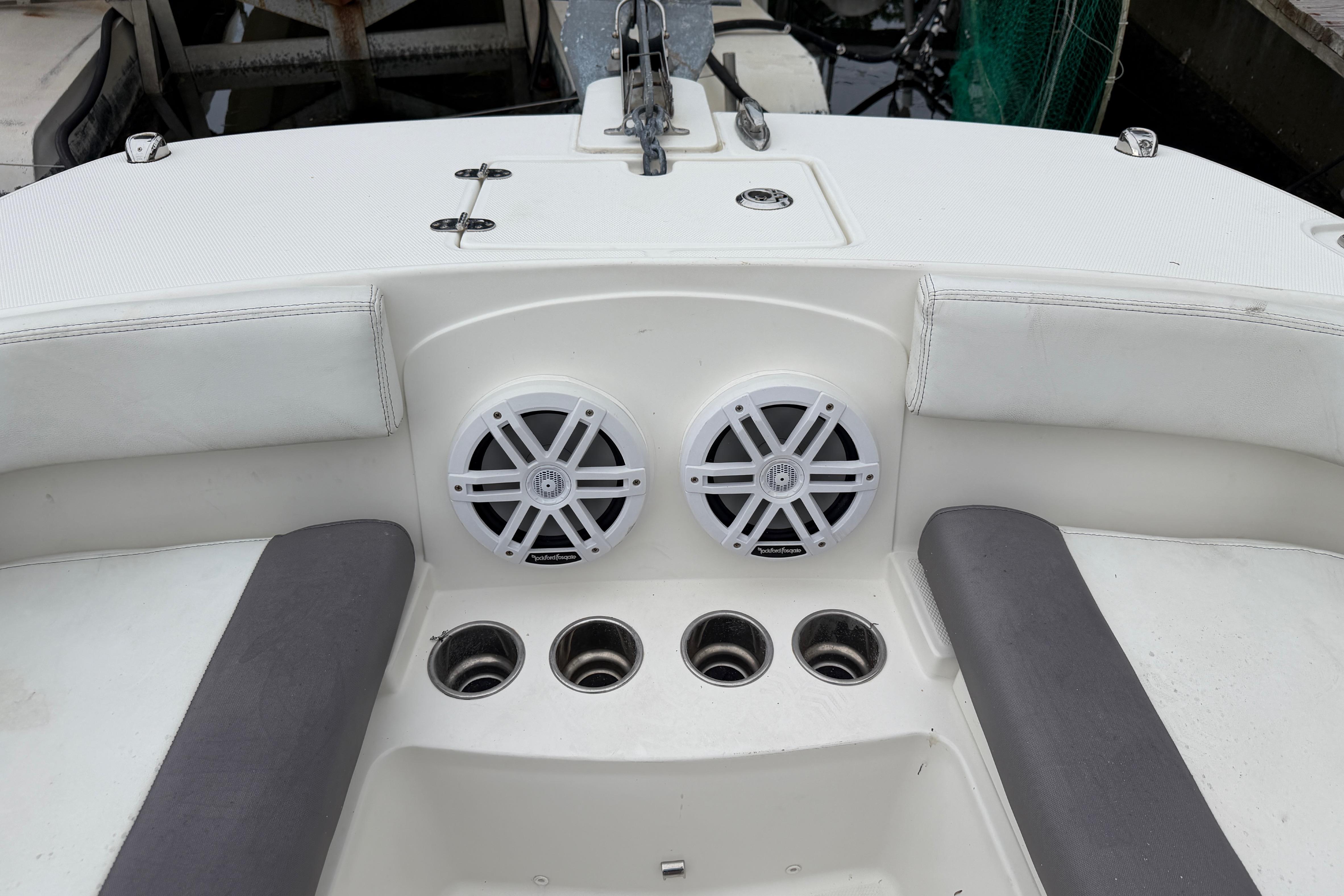 2019 World Cat 230 DC boat interior with speakers and cup holders.