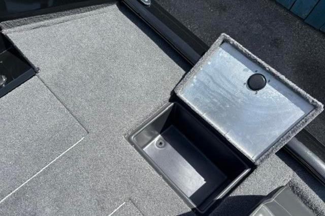 2023 Tracker Pro Team 190 TX Tournament Edition boat storage compartment, open and empty.