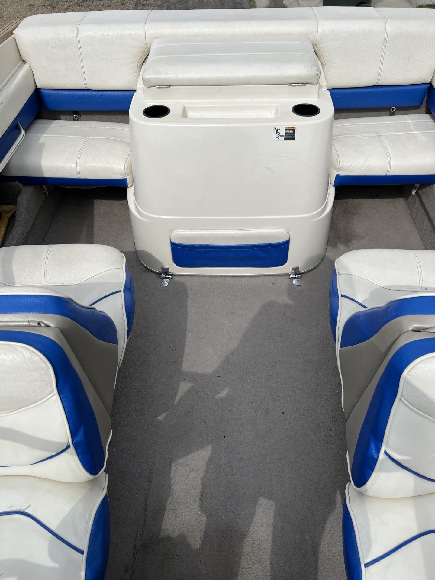 Interior of a 1991 Maxum 1800 SR with white and blue seating.