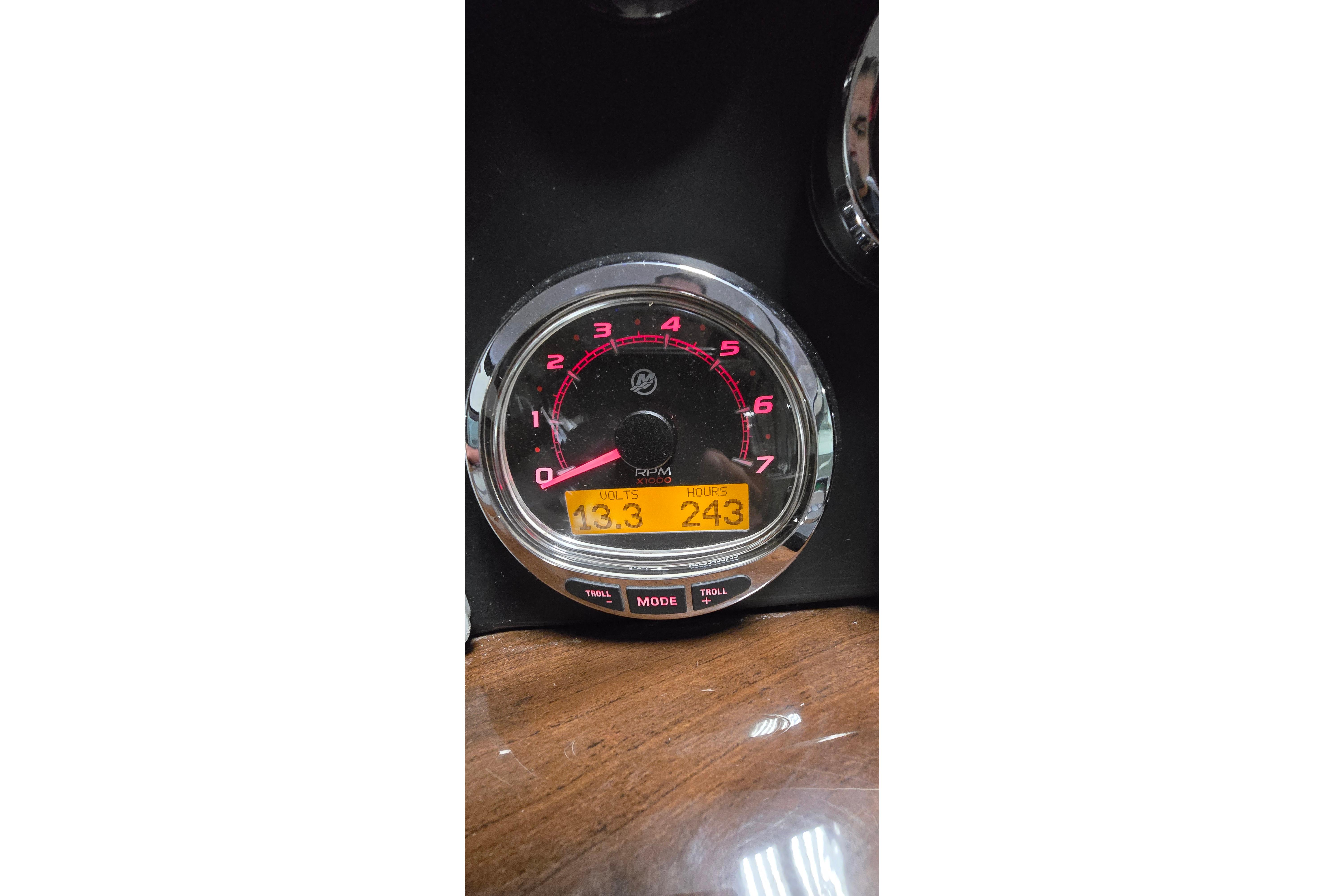 Gauge display on 2018 Four Winns V355 boat showing 13.3 volts and 243 hours.
