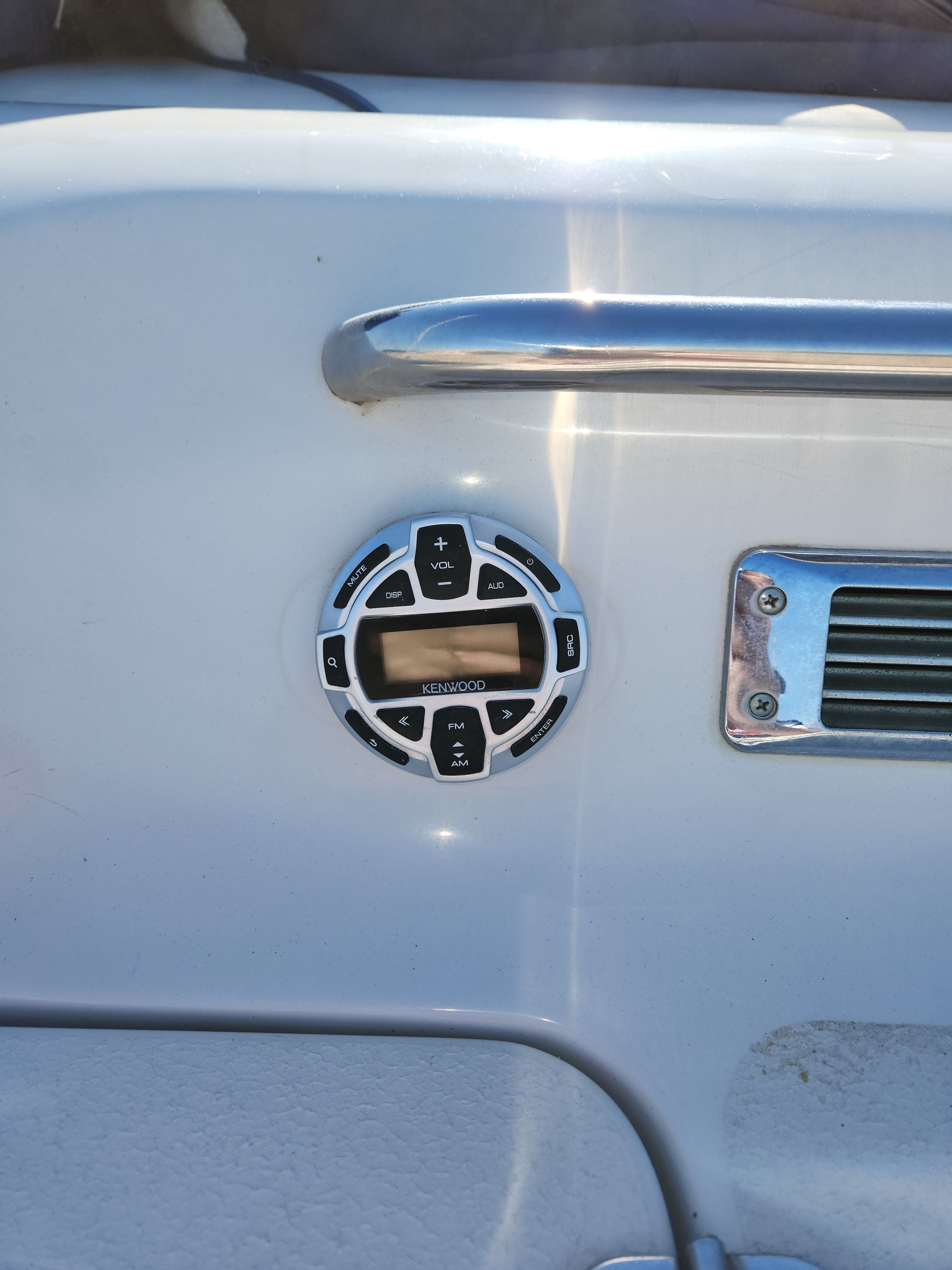Kenwood control on 2003 Crownline 225 BR boat panel.