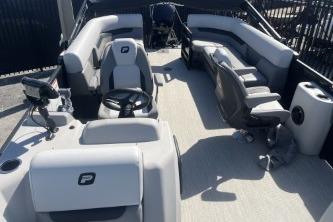 2026 Princecraft Vectra 23 L pontoon boat interior with plush seating and modern helm.