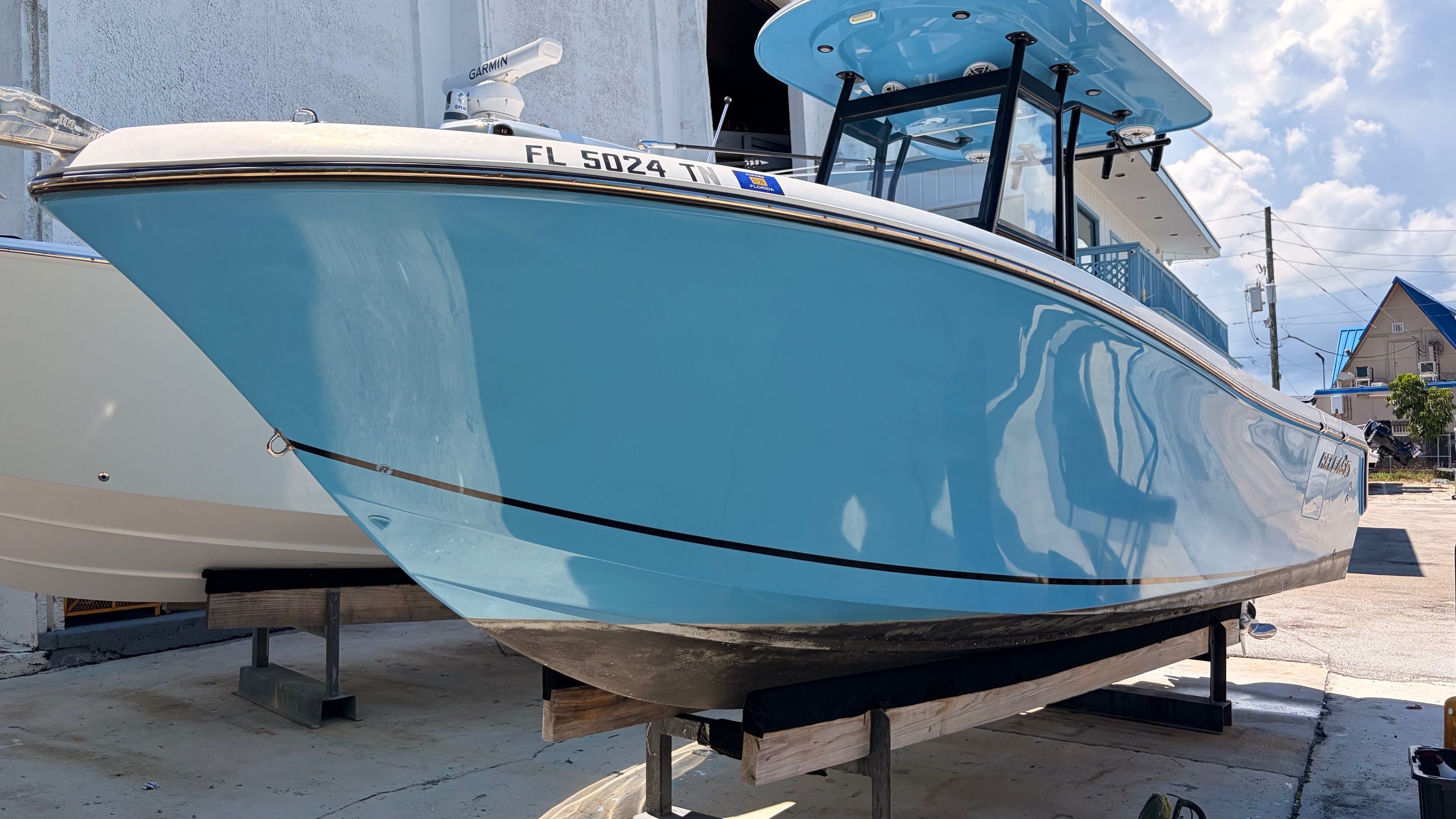 Blue Release 240 RX 2022 boat on dry dock.