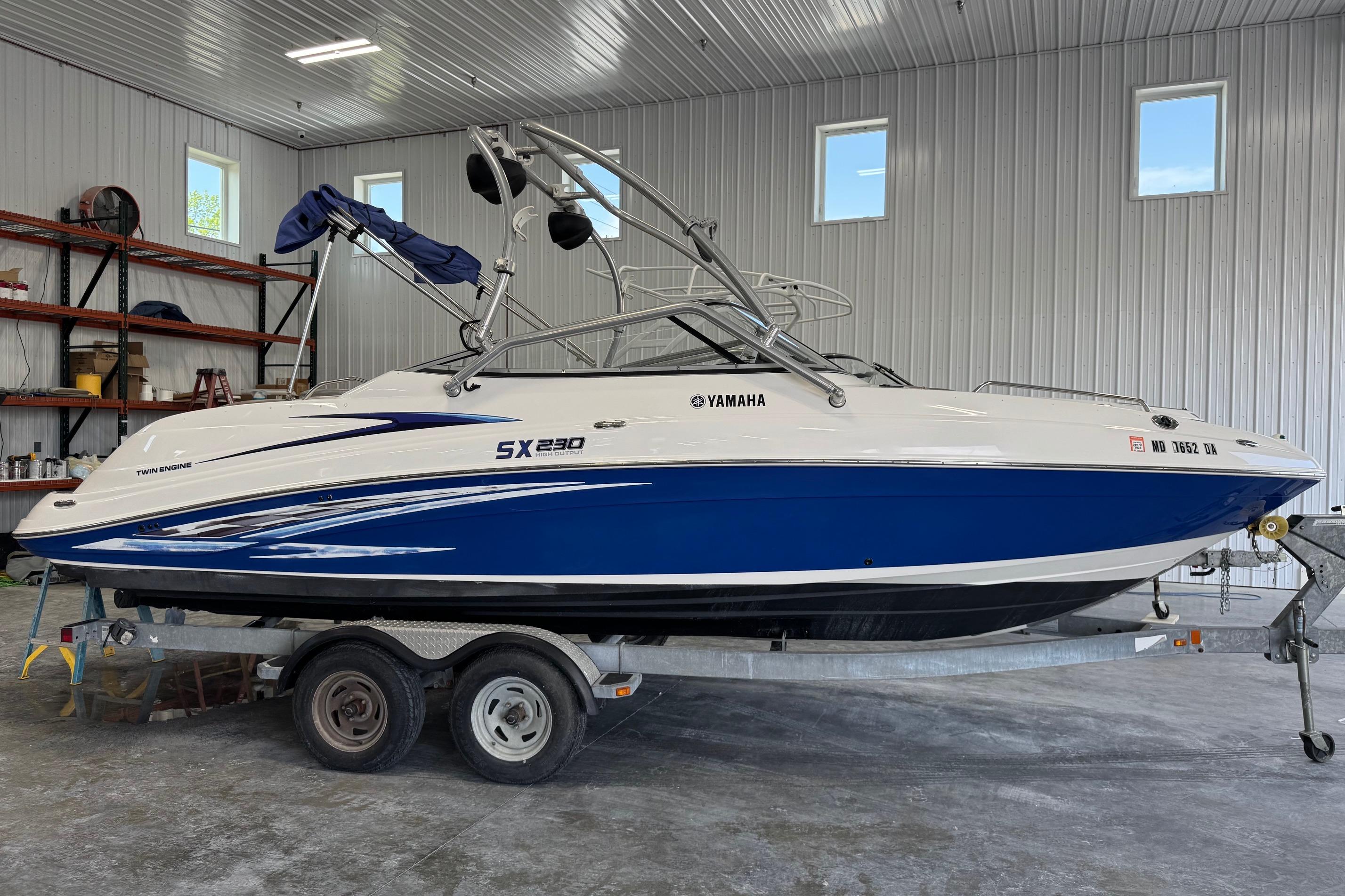 2007 Yamaha Boats SX230 HO on trailer in indoor storage facility.