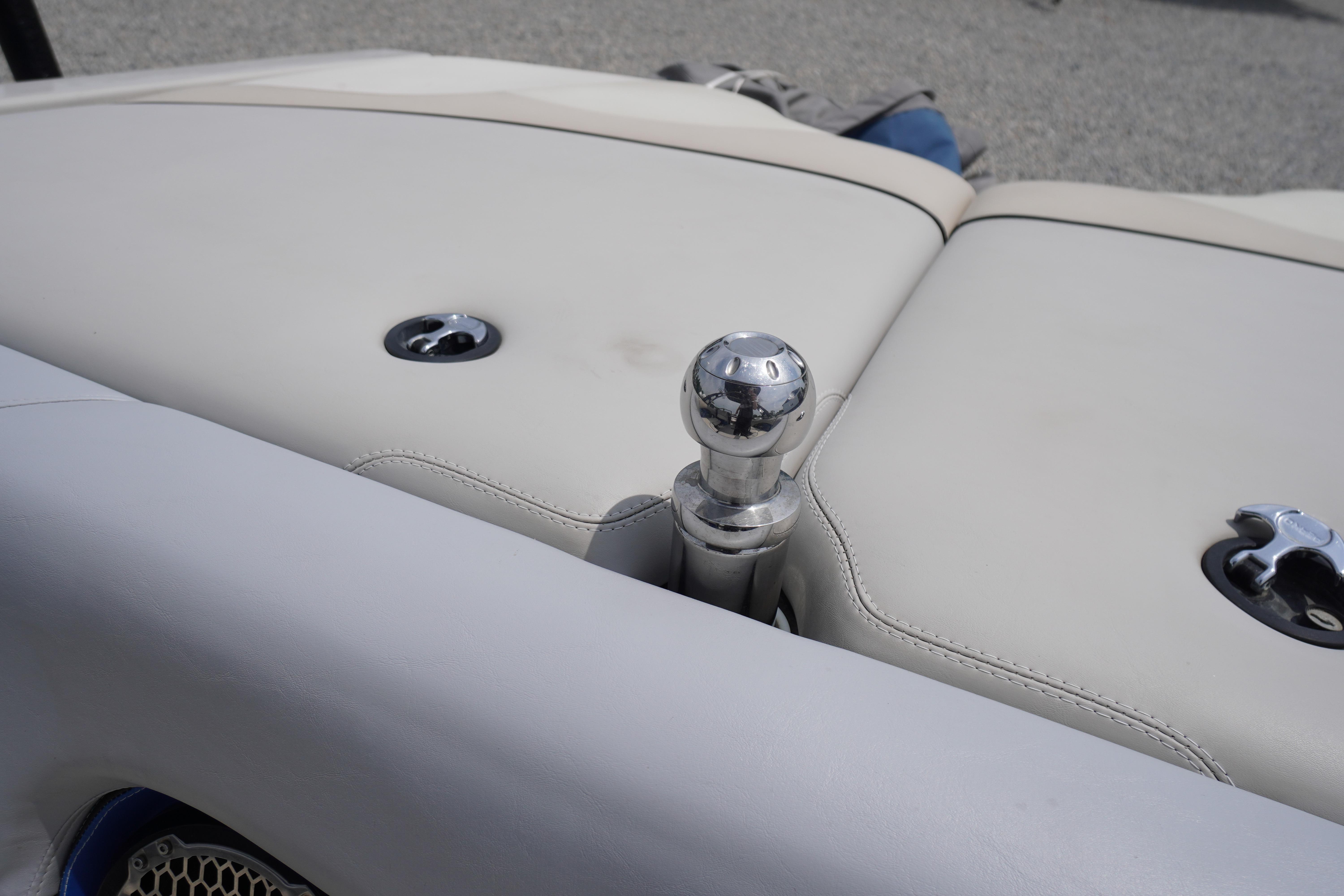 2011 Malibu Wakesetter 21 VLX interior with chrome details and beige upholstery.
