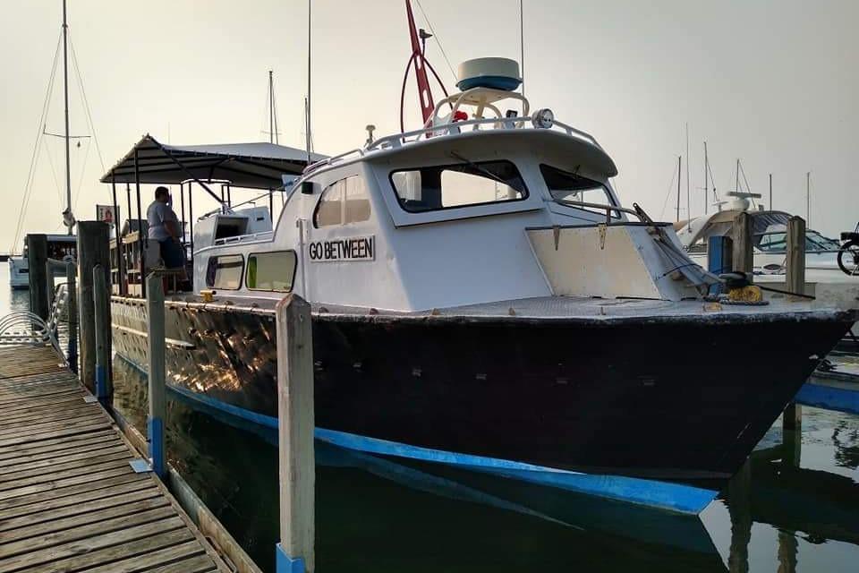 1974 Breaux's Bay Craft Passenger boat docked, named "Go Between," with COI certification.