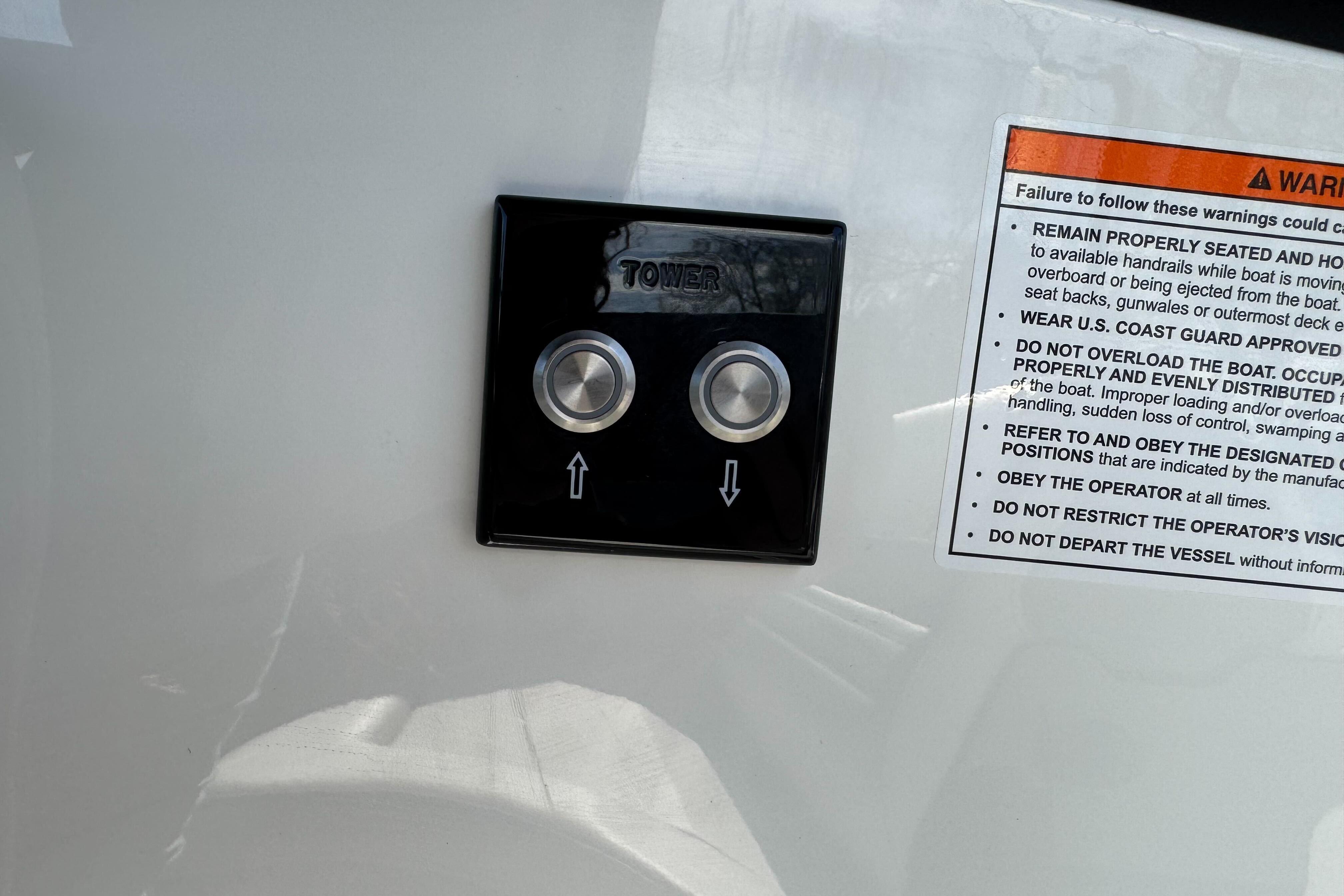 Control panel and safety warning on 2026 Sea Ray SLX 260 boat.