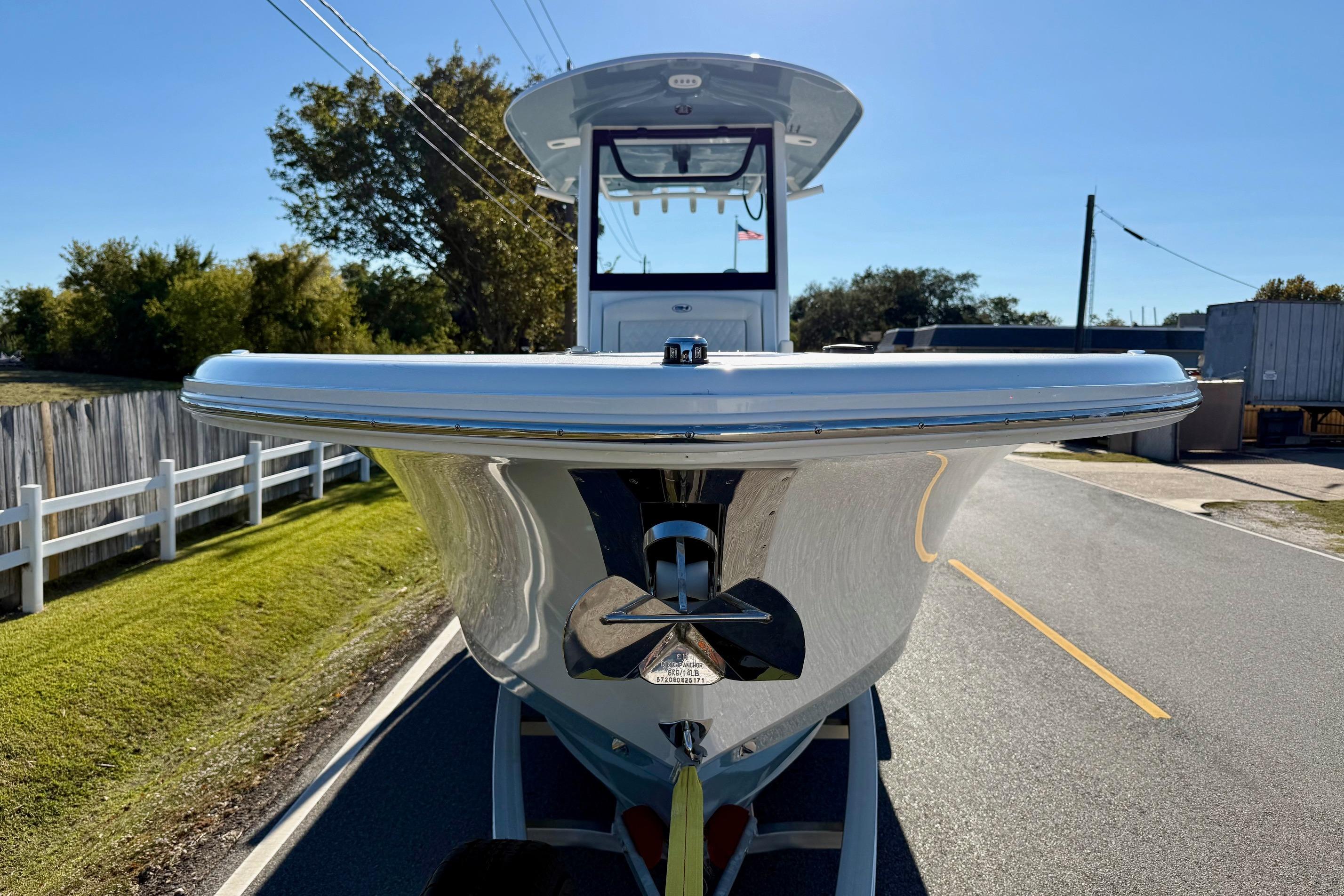 2026 Sea Hunt Ultra 275 Coffin Box boat on trailer, front view.