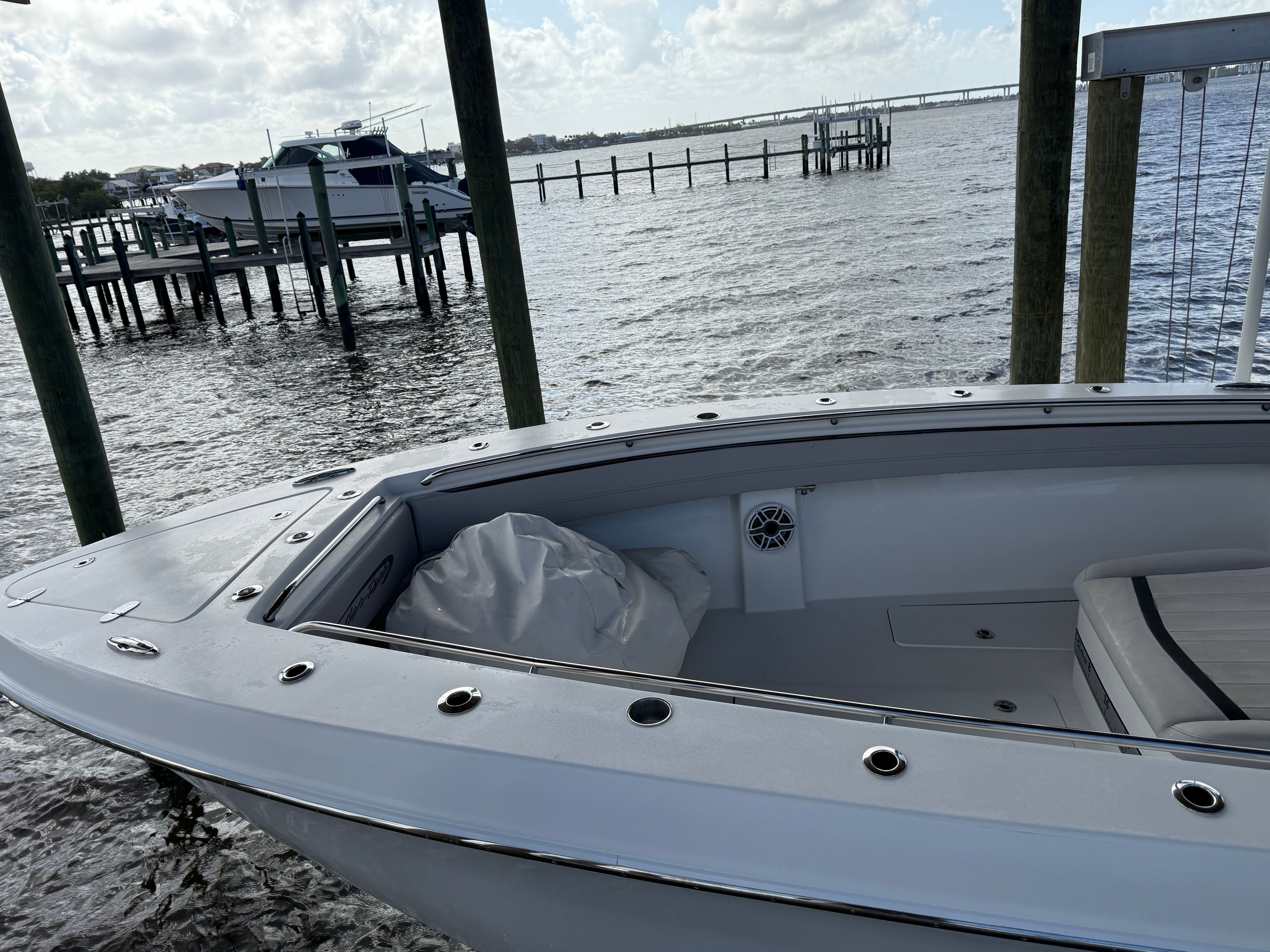 Nor-Tech 392 Super Fish 2018 at dock, calm water in background.