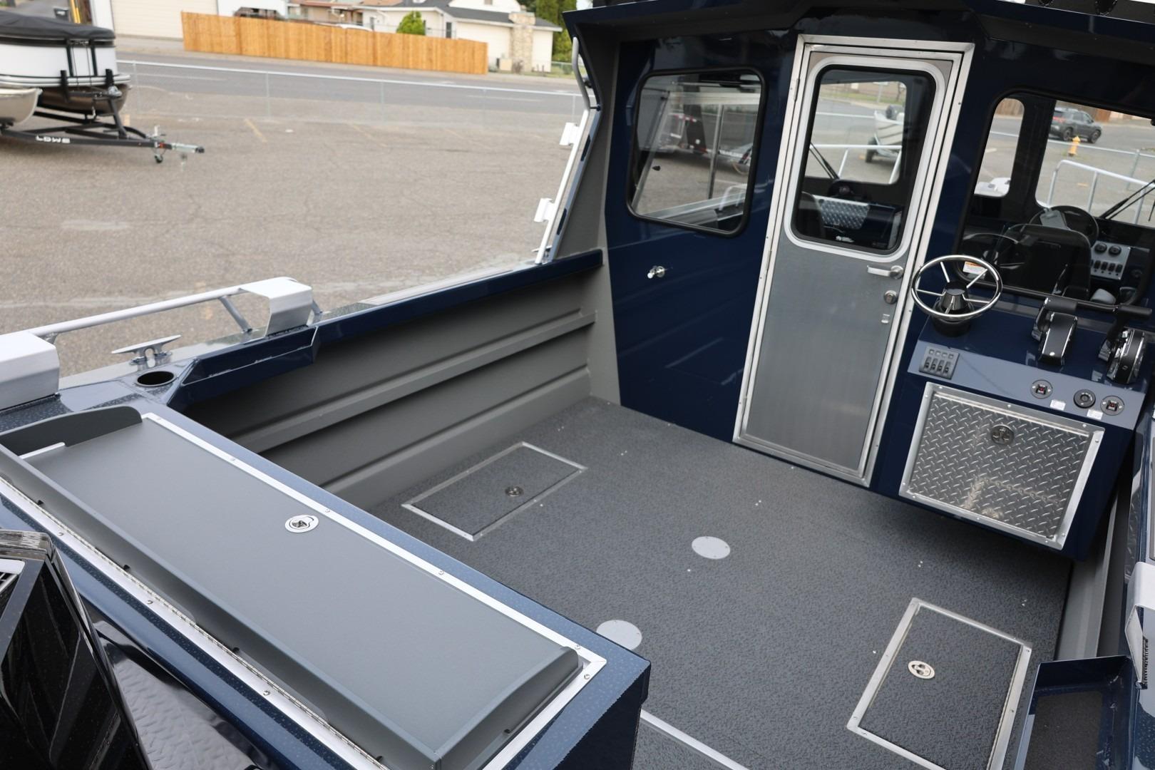 Interior view of 2026 Thunder Jet 24 Alexis Pro boat, featuring spacious cockpit and modern controls.