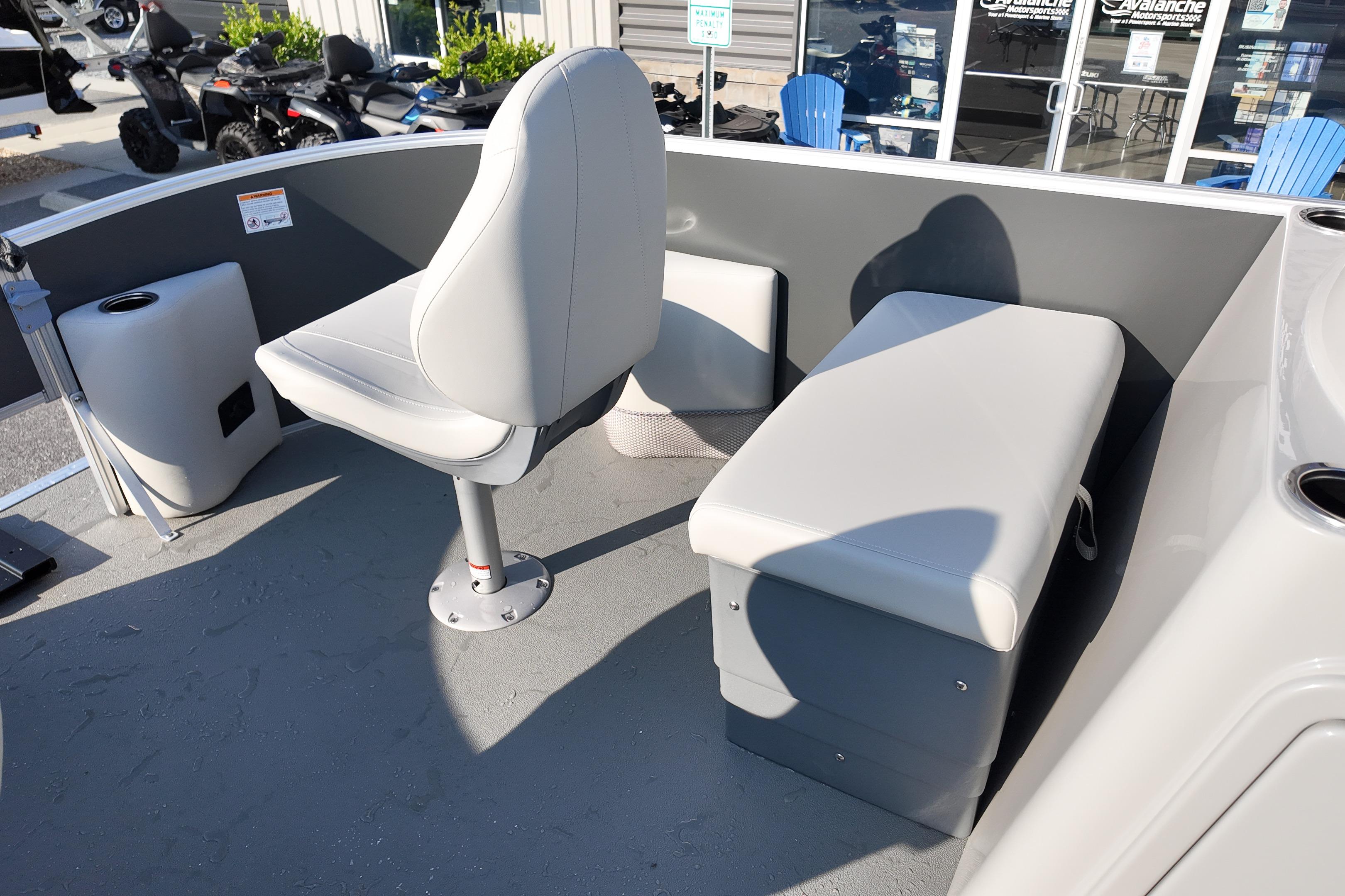2026 Sylvan Mirage 818 Fish boat interior with seating and storage.