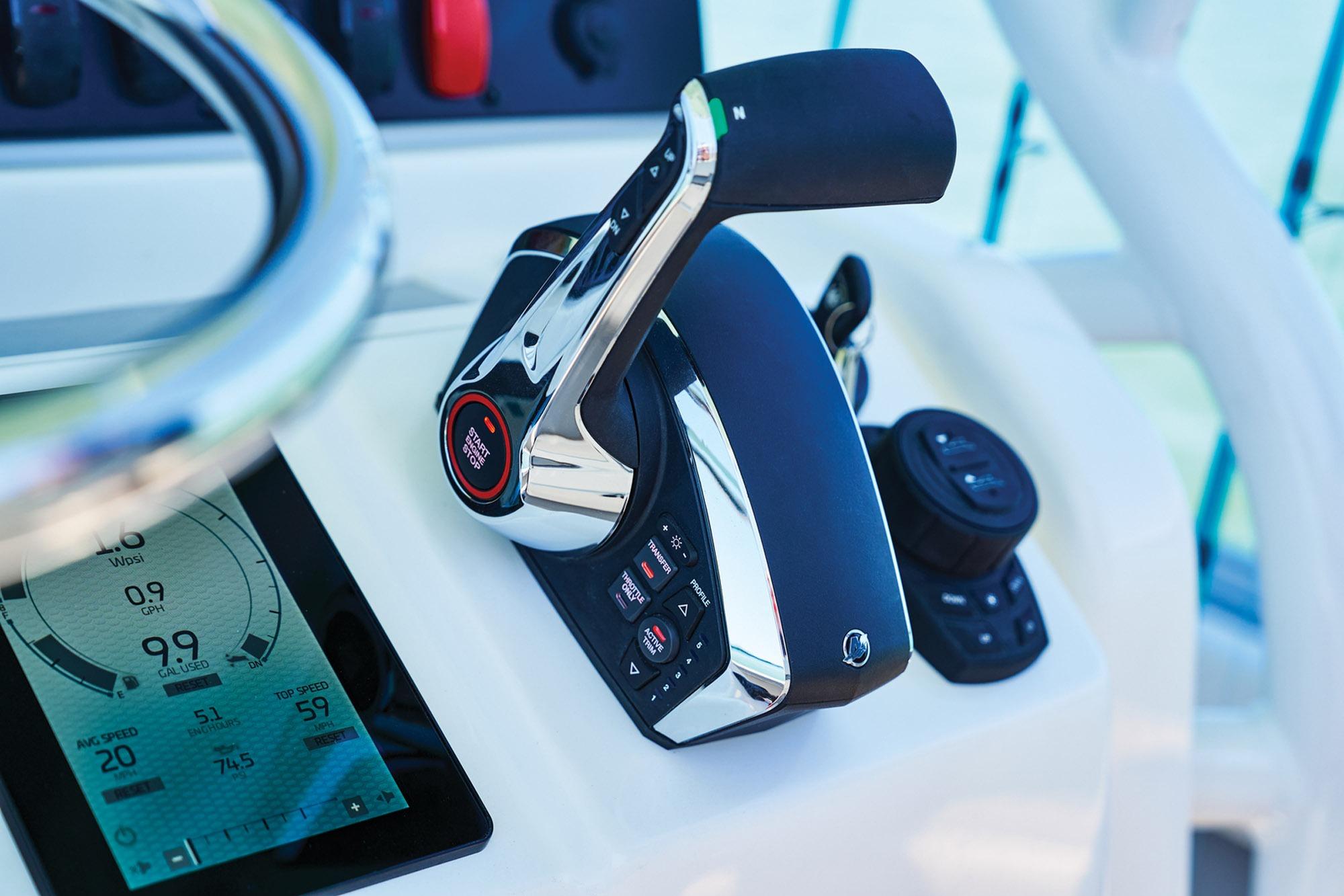 Close-up of 2026 Mako 24 APEX boat controls and digital display.