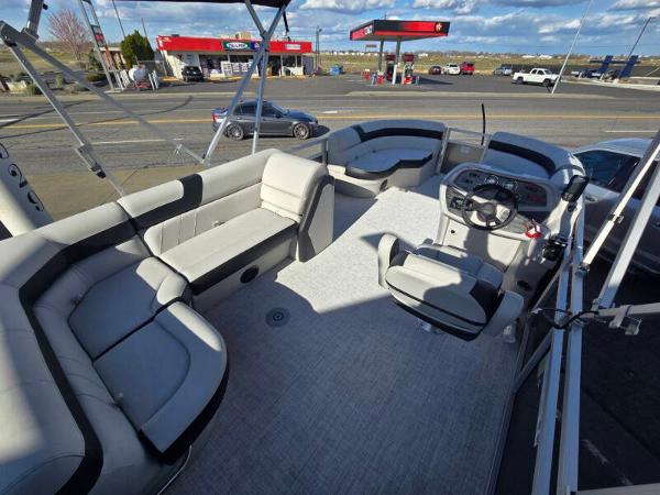 2025 Berkshire 20 CL pontoon boat interior with plush seating and modern dashboard.