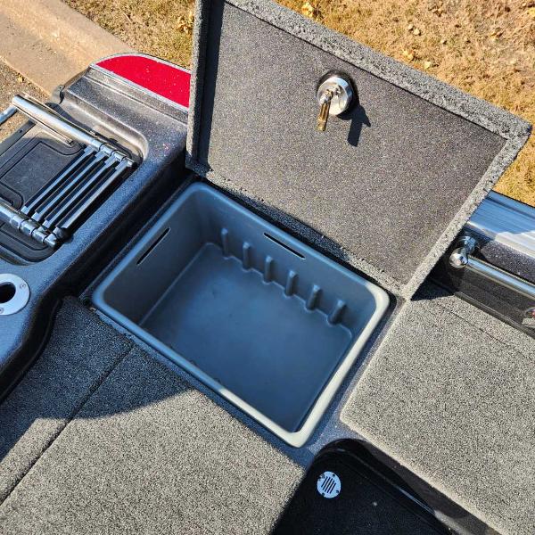 2024 Nitro ZV20 Pro boat storage compartment with open lid and key lock.