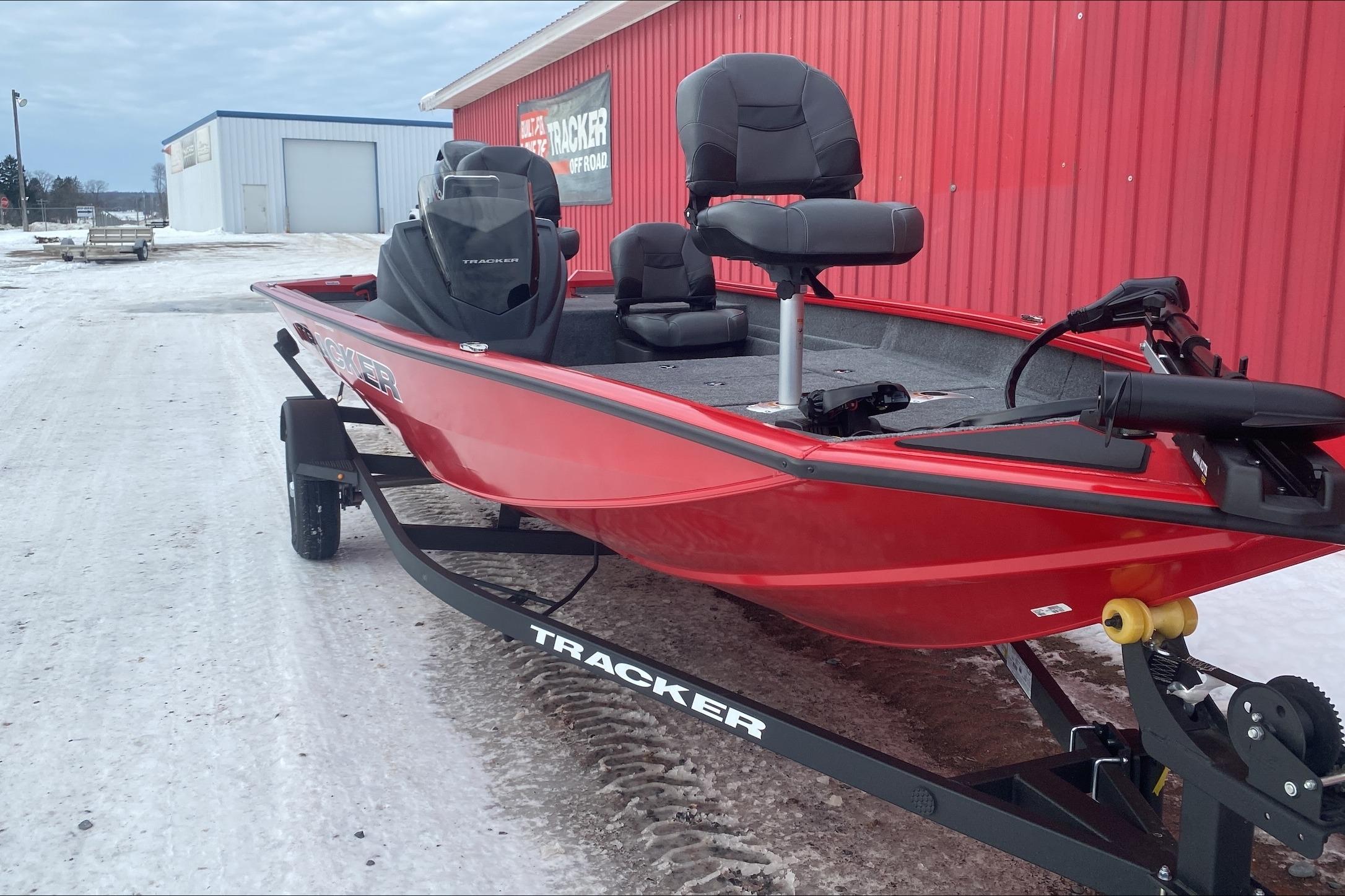 2026 Tracker Pro Team 175 Crappie Edition boat on snowy ground, red exterior.