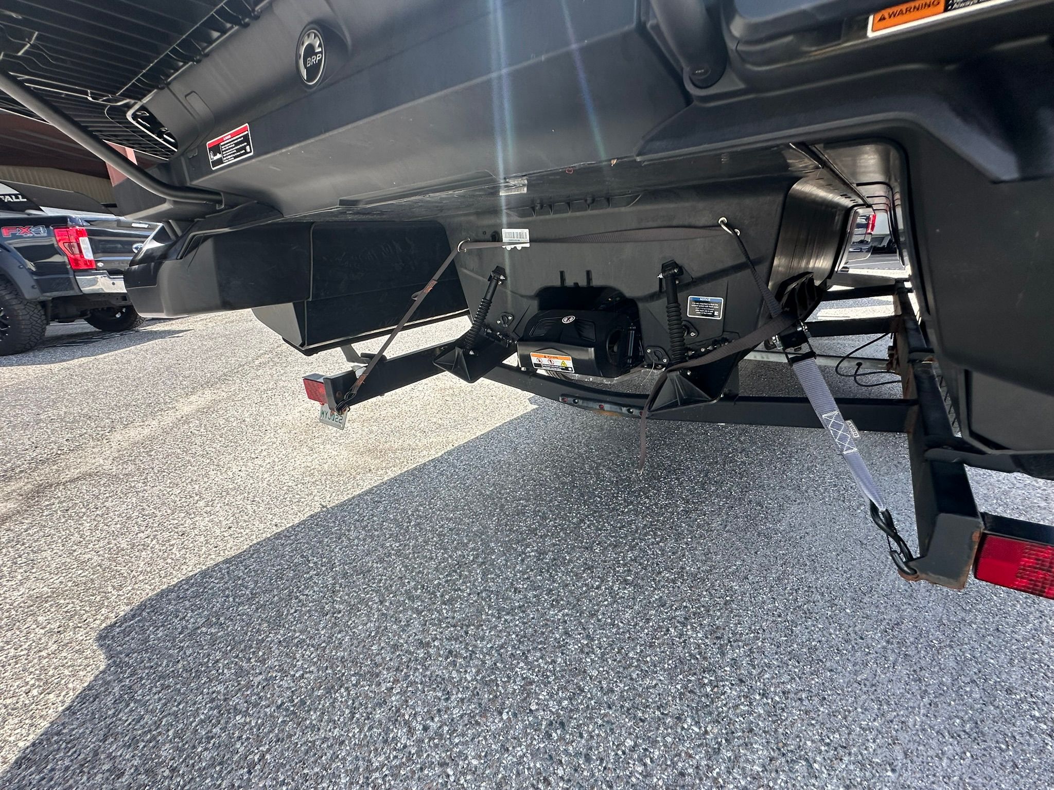 Underside of a 2023 Sea-Doo 21 SWITCH SPORT on a trailer.
