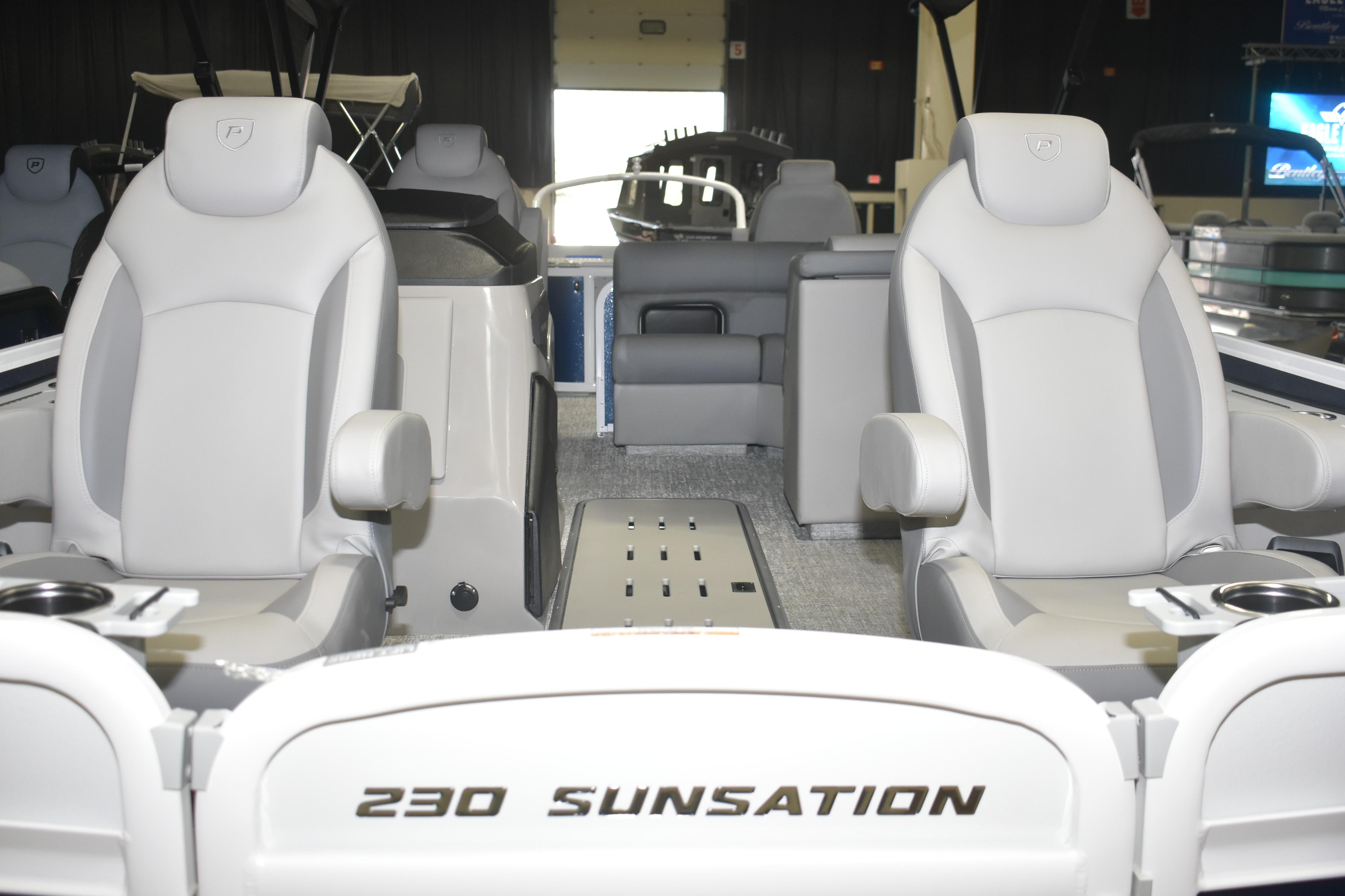 2026 Premier 230 Sunsation Angler 4PT boat interior with plush seating and modern design.