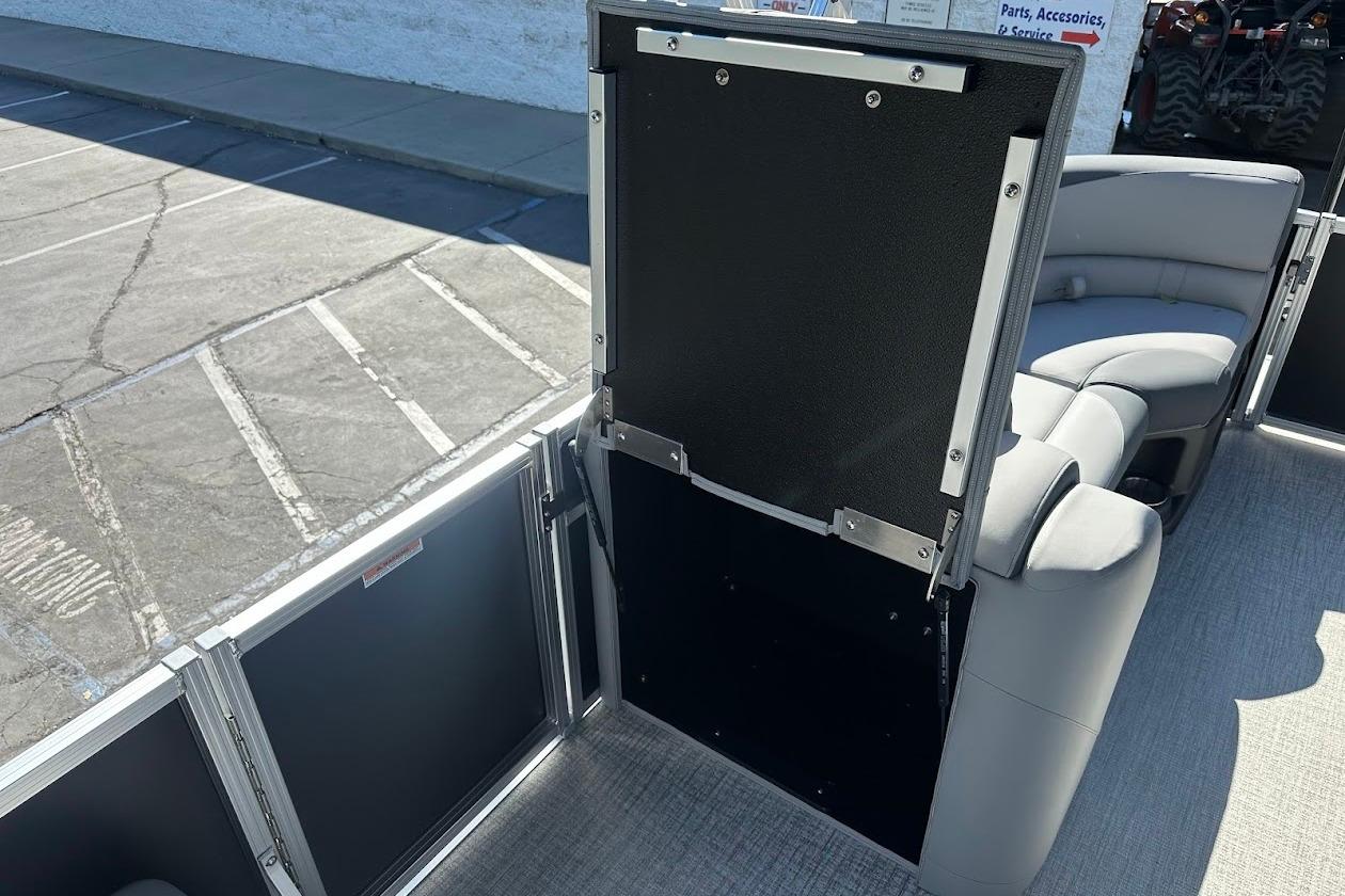2026 Tahoe Pontoon LTZ Quad Lounger Shift 23 interior with seating and storage compartment.