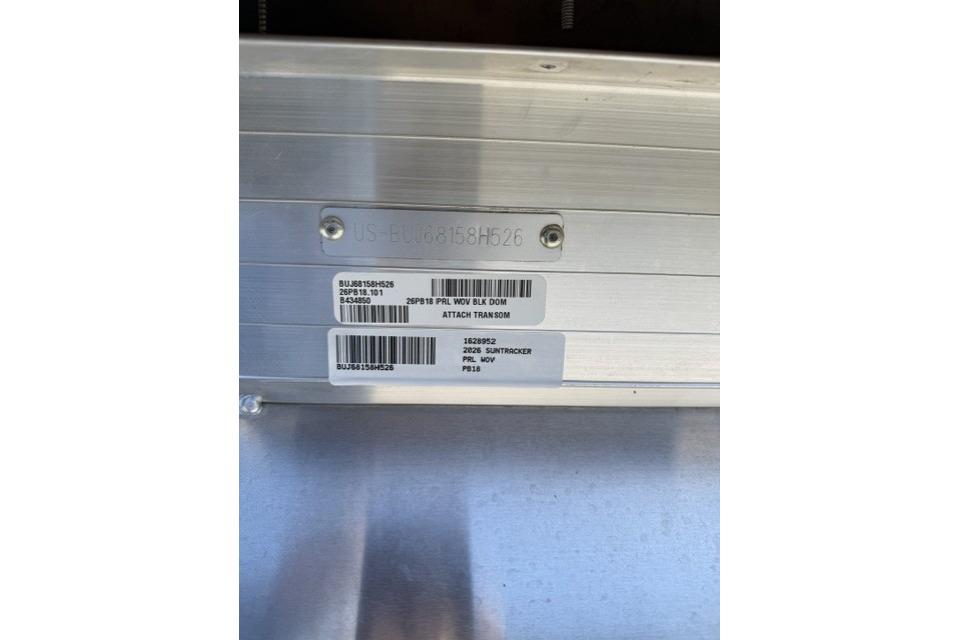2026 Sun Tracker Party Barge 18 DLX identification plate with serial numbers and barcodes.