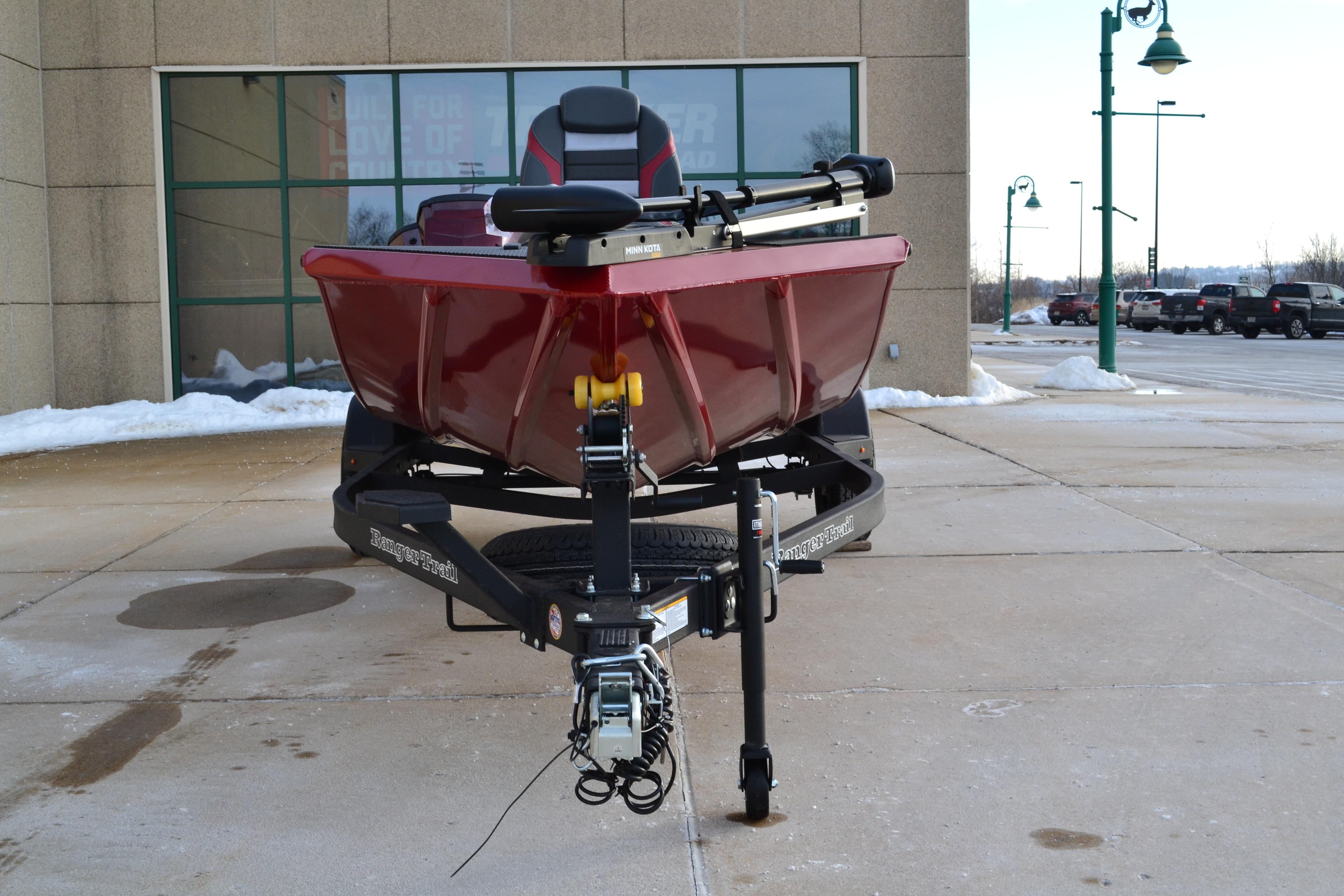 2026 Ranger RT188 boat on trailer, parked outdoors in snowy setting.