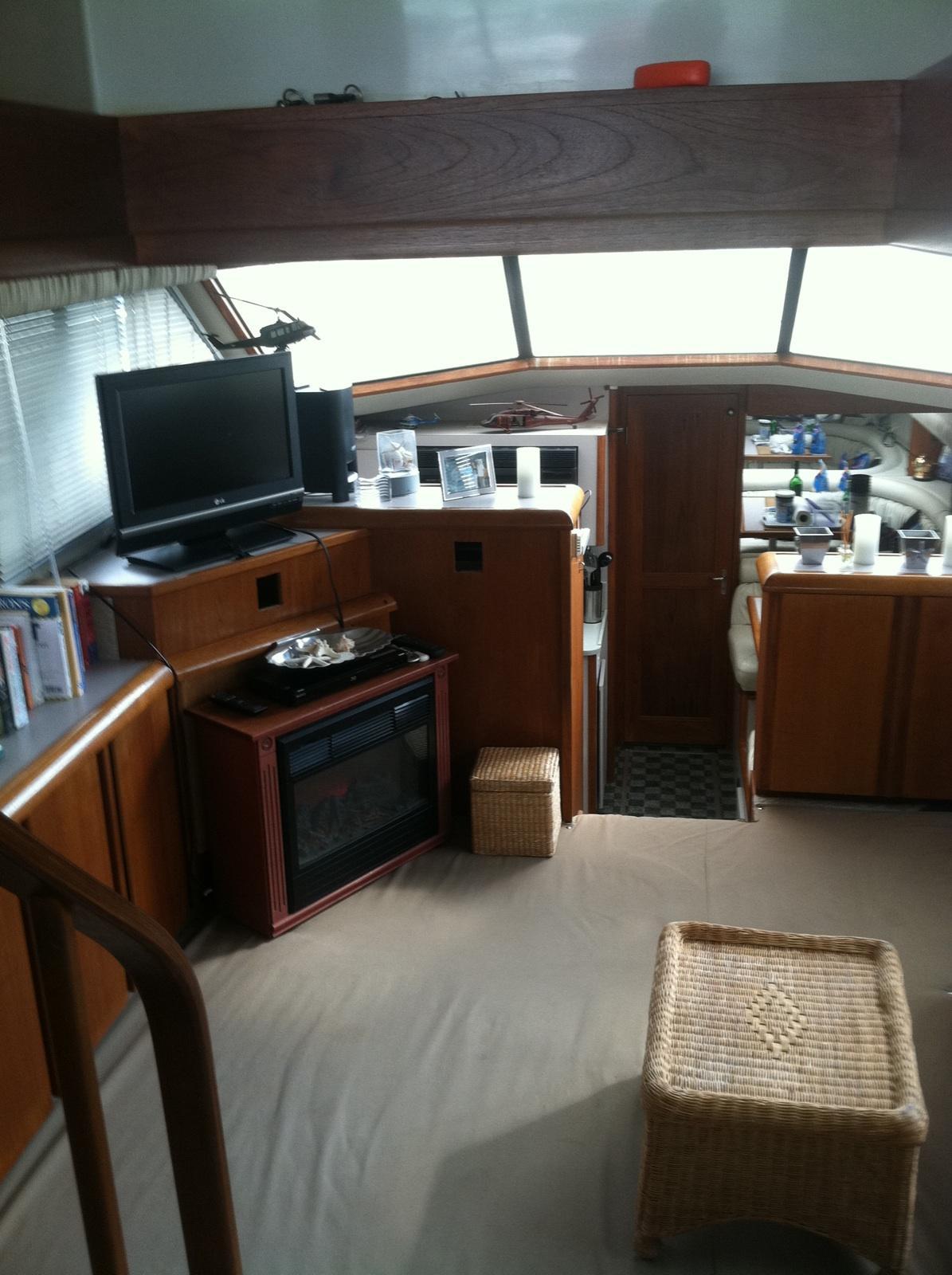 Interior of 1989 Californian 48 Motor Yacht with cozy living area and modern amenities.
