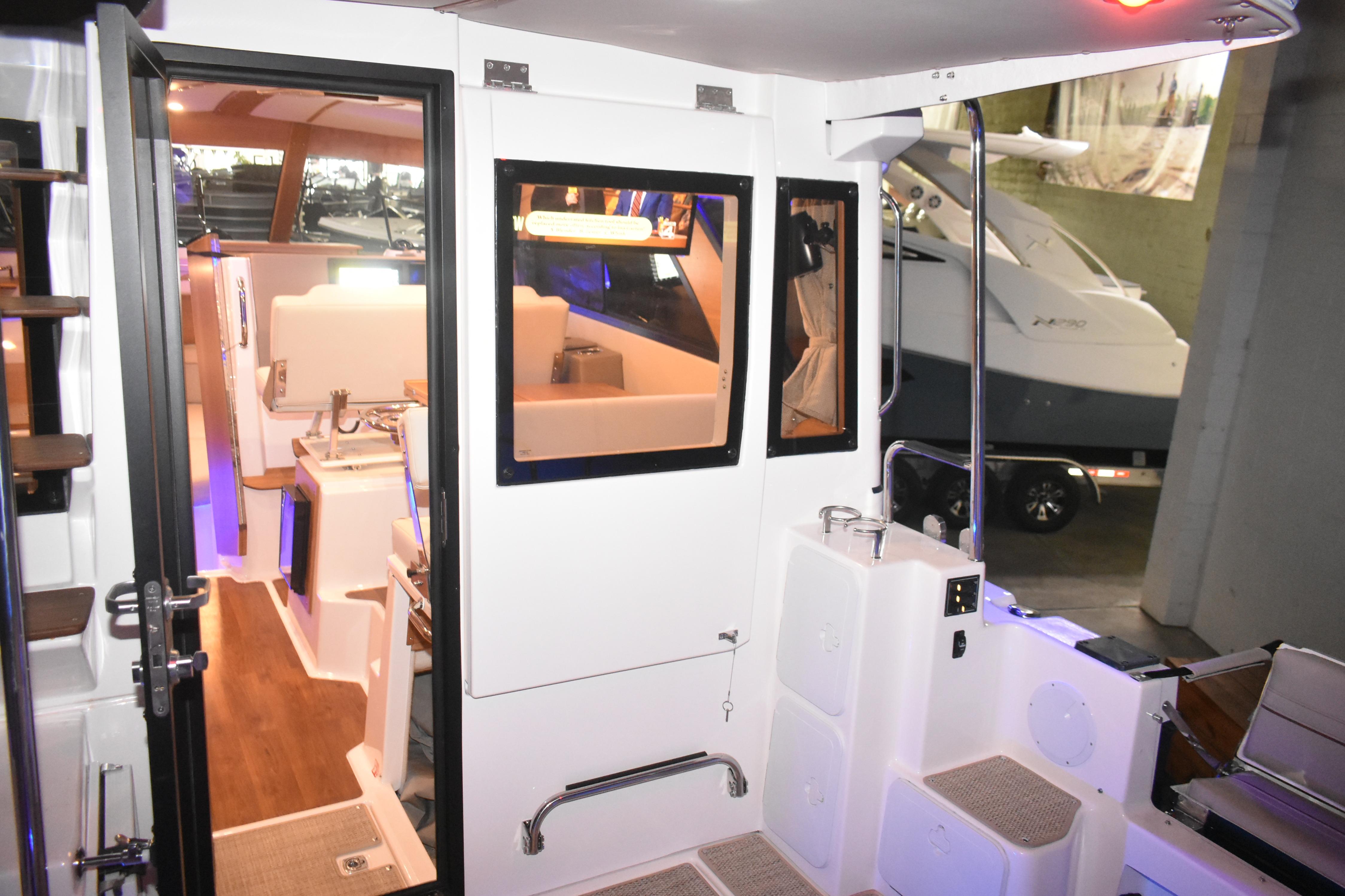 Interior view of 2026 Cutwater C-32 CB boat, showcasing modern design and amenities.
