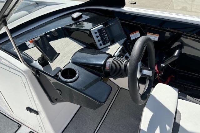 2026 Yamaha Boats AR220 dashboard with steering wheel and control panel.
