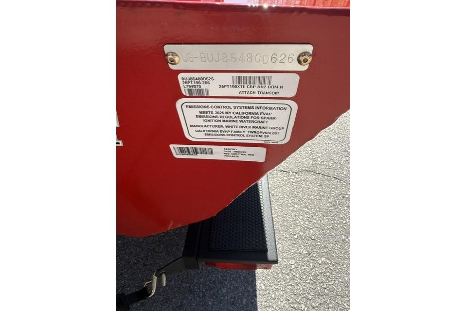 2026 Tracker Pro Team 190 boat transom with emissions control information labels.
