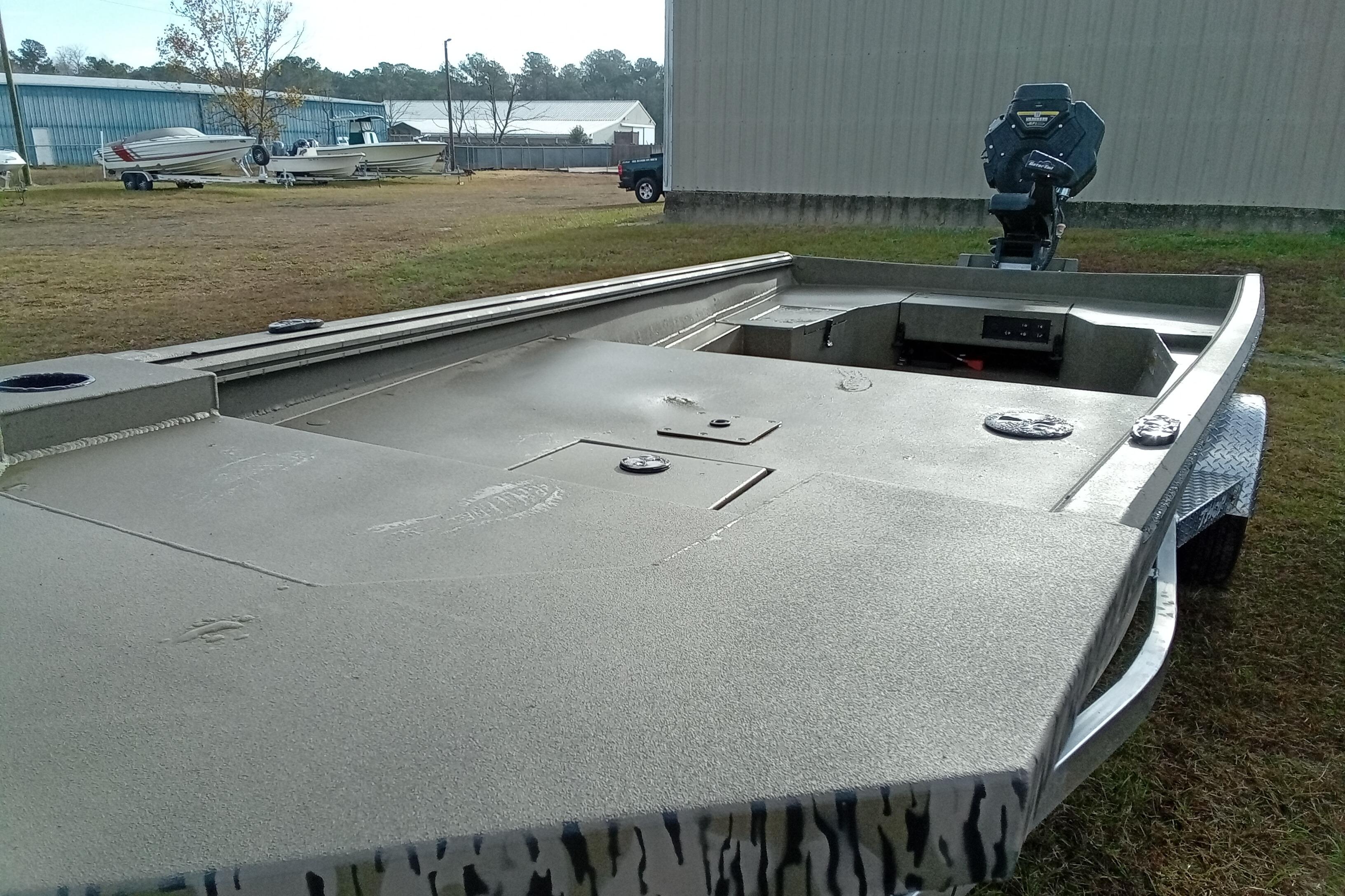 2026 Thor 1754 Swamp Hammer boat on trailer, outdoor setting.