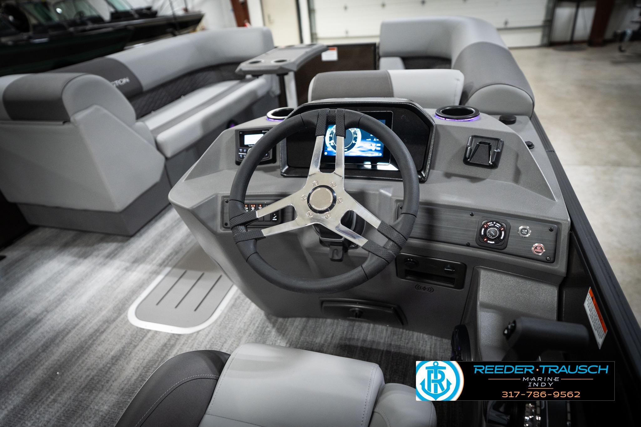 2026 Bennington 21 SSR boat interior with modern steering console and seating.