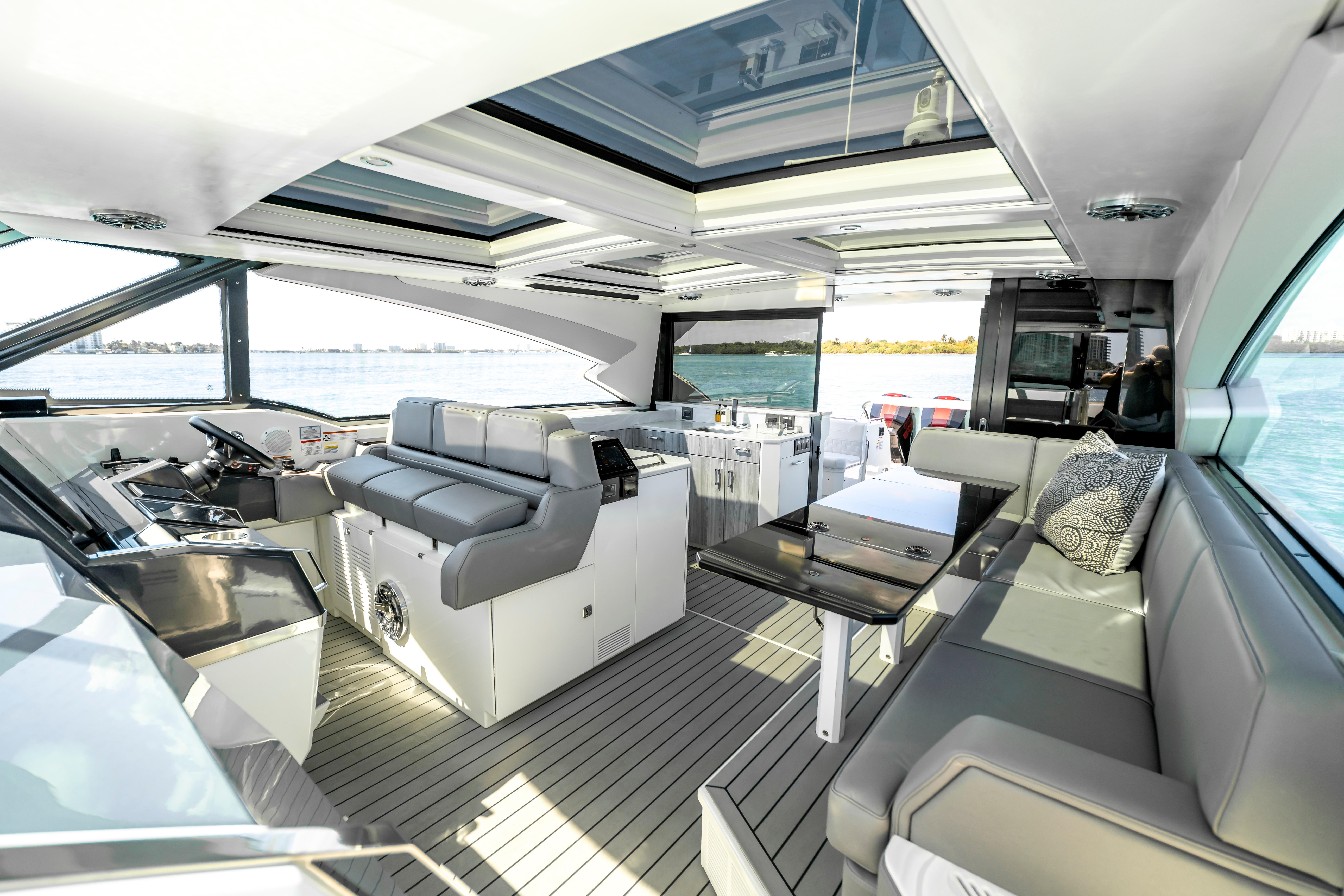Luxurious interior of 2022 Formula 500 Super Sport Crossover yacht with modern seating and panoramic views.