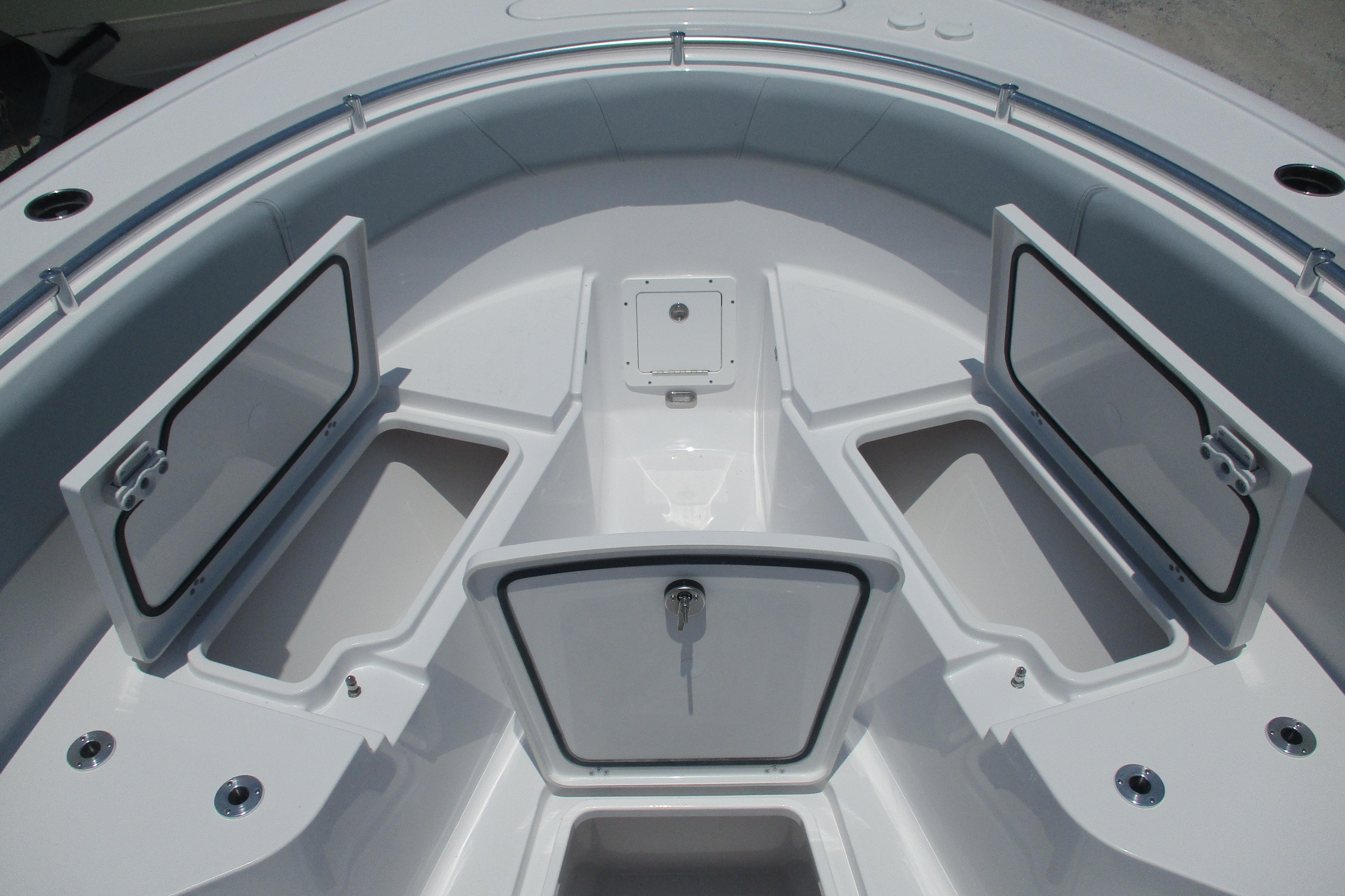 2027 Sportsman Open 252 Center Console boat with open storage compartments.
