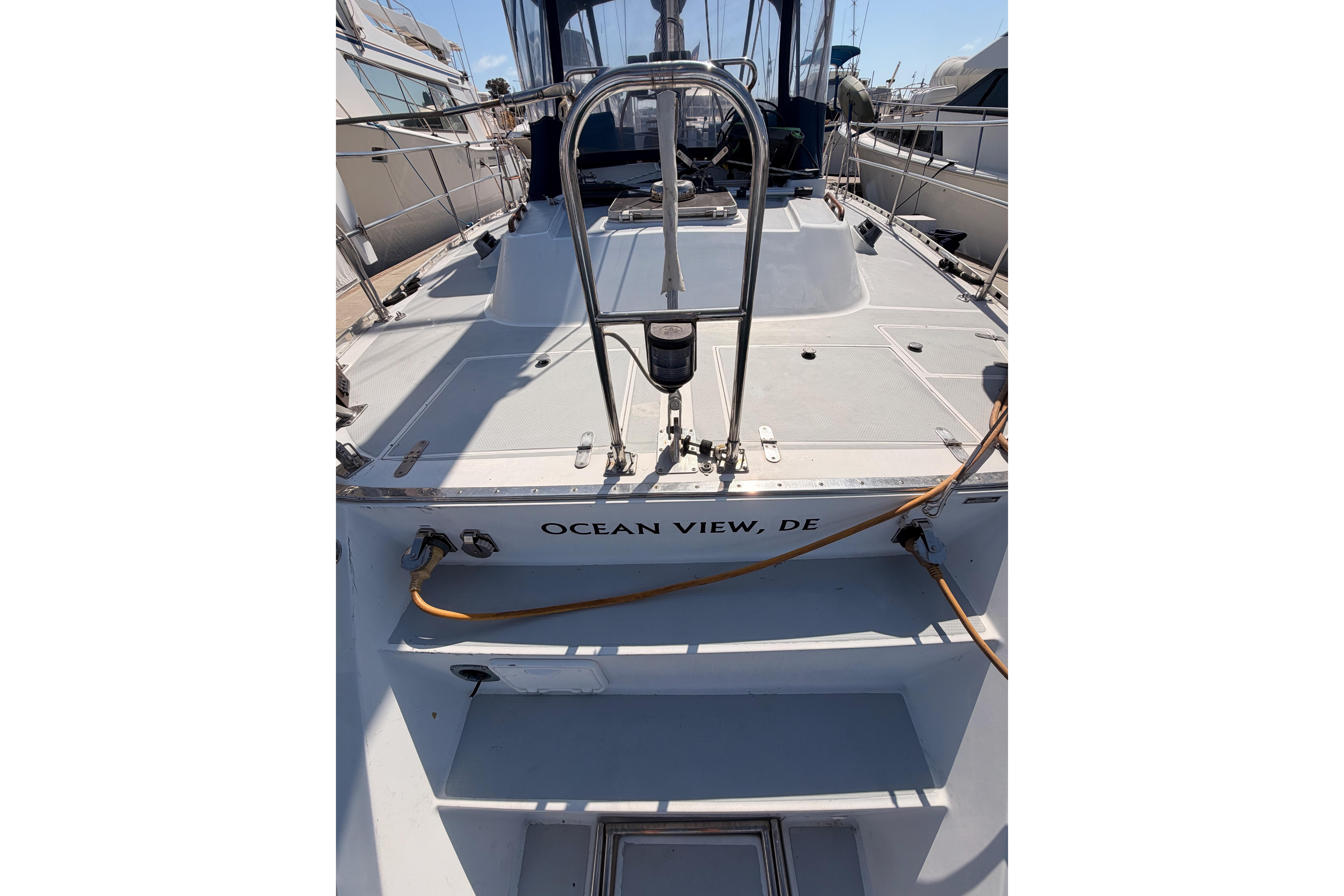 Sailboat deck of 1991 Hylas 51, docked in Ocean View, DE marina.