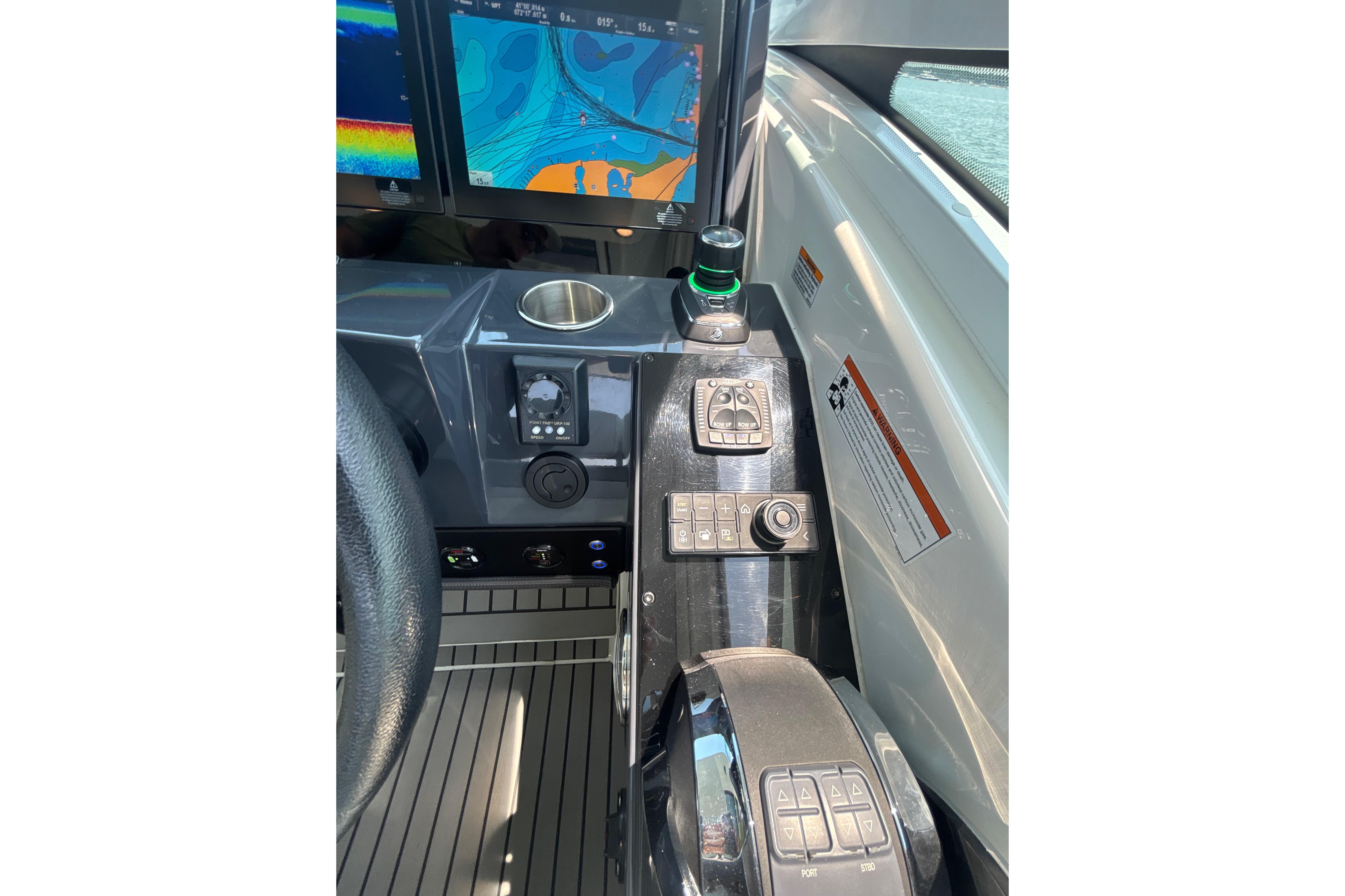 Control panel of 2019 Formula 430 Super Sport Crossover with navigation screens and controls.