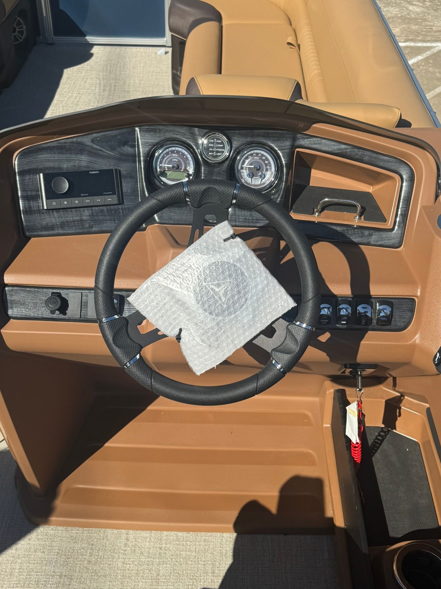 Interior of 2025 Tahoe 2585 LTZ VRB with steering wheel and dashboard.