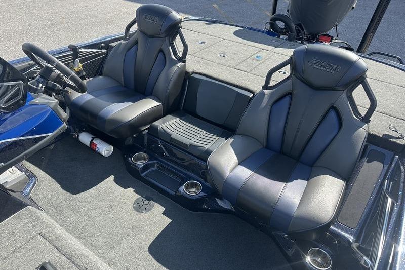 2020 Skeeter FXR21 boat interior with dual black seats and steering wheel.